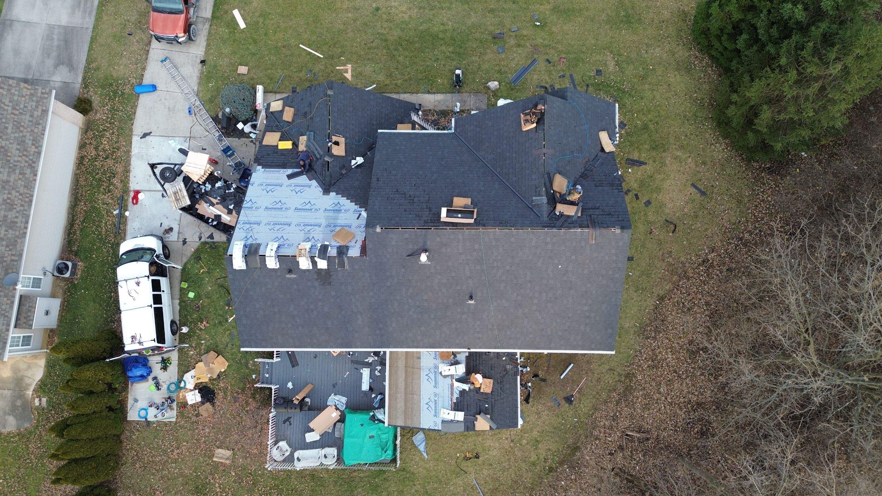 Walden Ponds - Pristine Black and Hydro Flo Gutter Guards by Tamlin Roofing