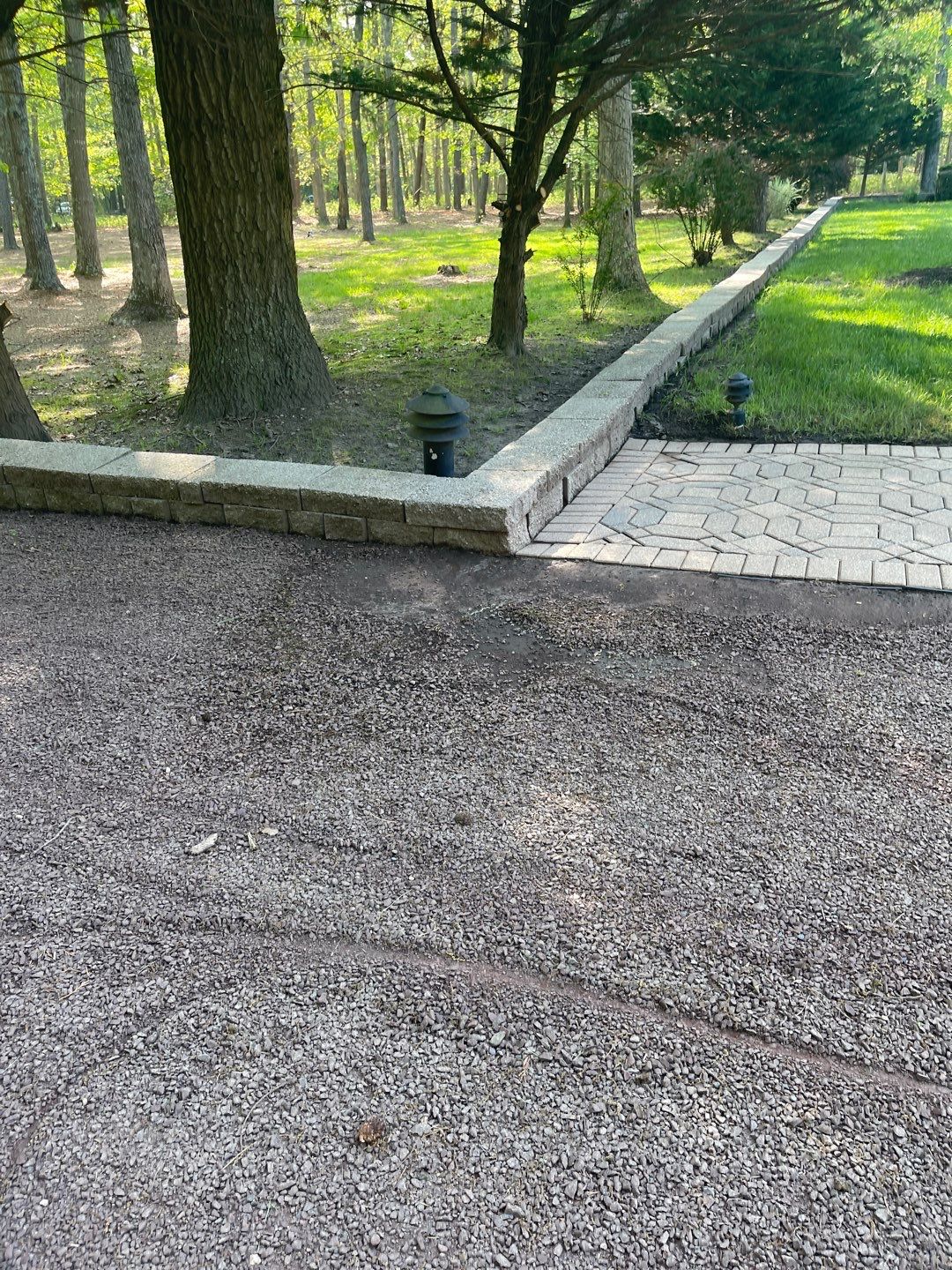 Pavers Cleaned, Garage and Concrete walls by SJ Exterior