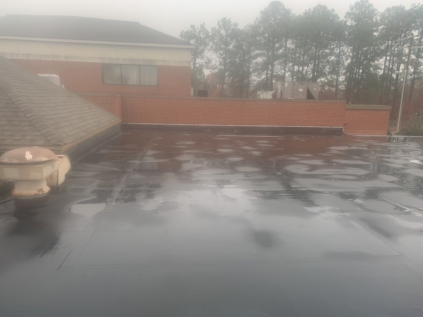 Re Roof (TPO) by American Roofing NC