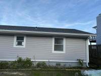 Siding Installation using JH Select Cedarmill Eased Edge by ExteriorPros