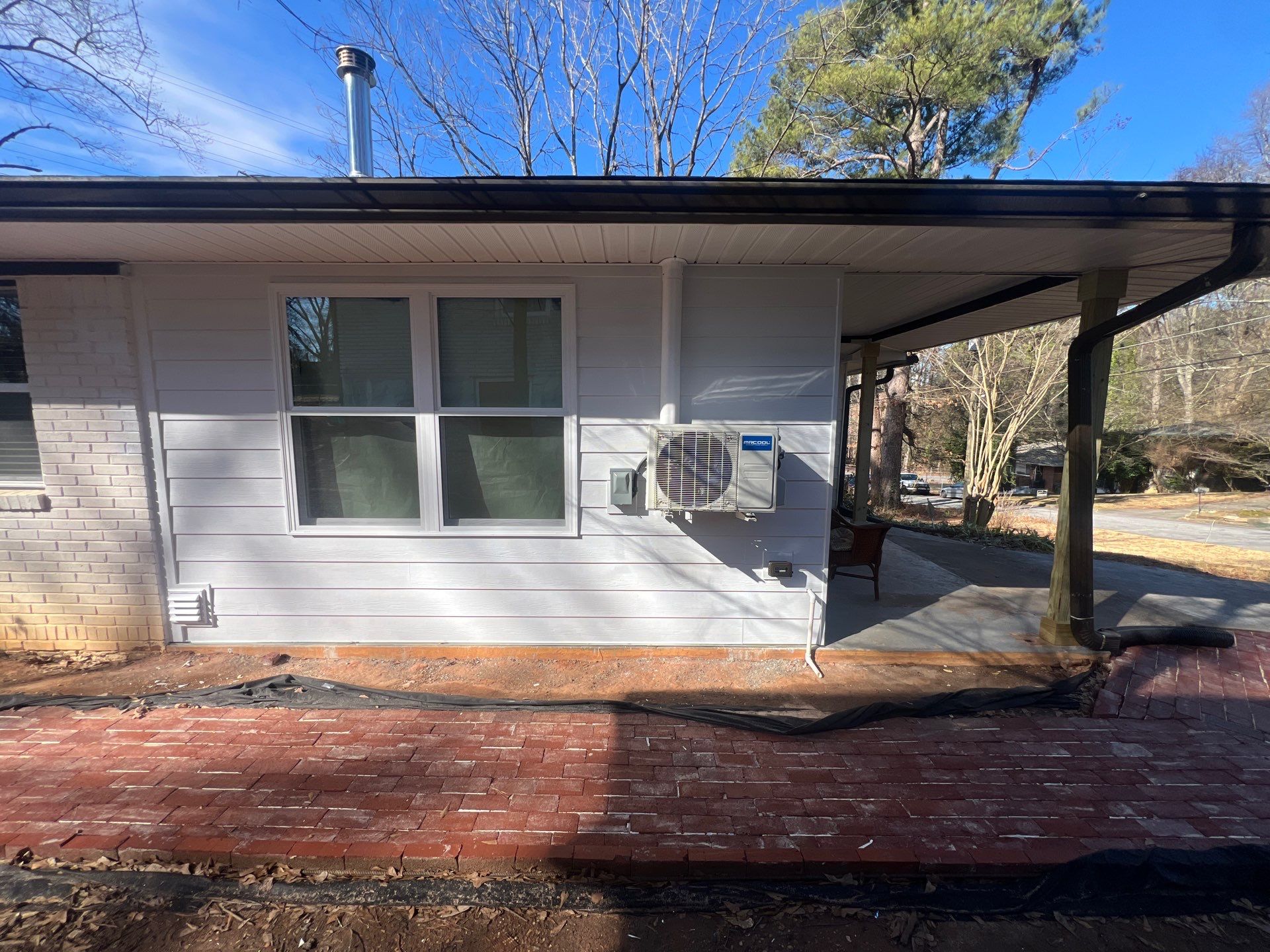 Full Home Transformation with Enclosed Living Room Addition by Swift Home Renovations