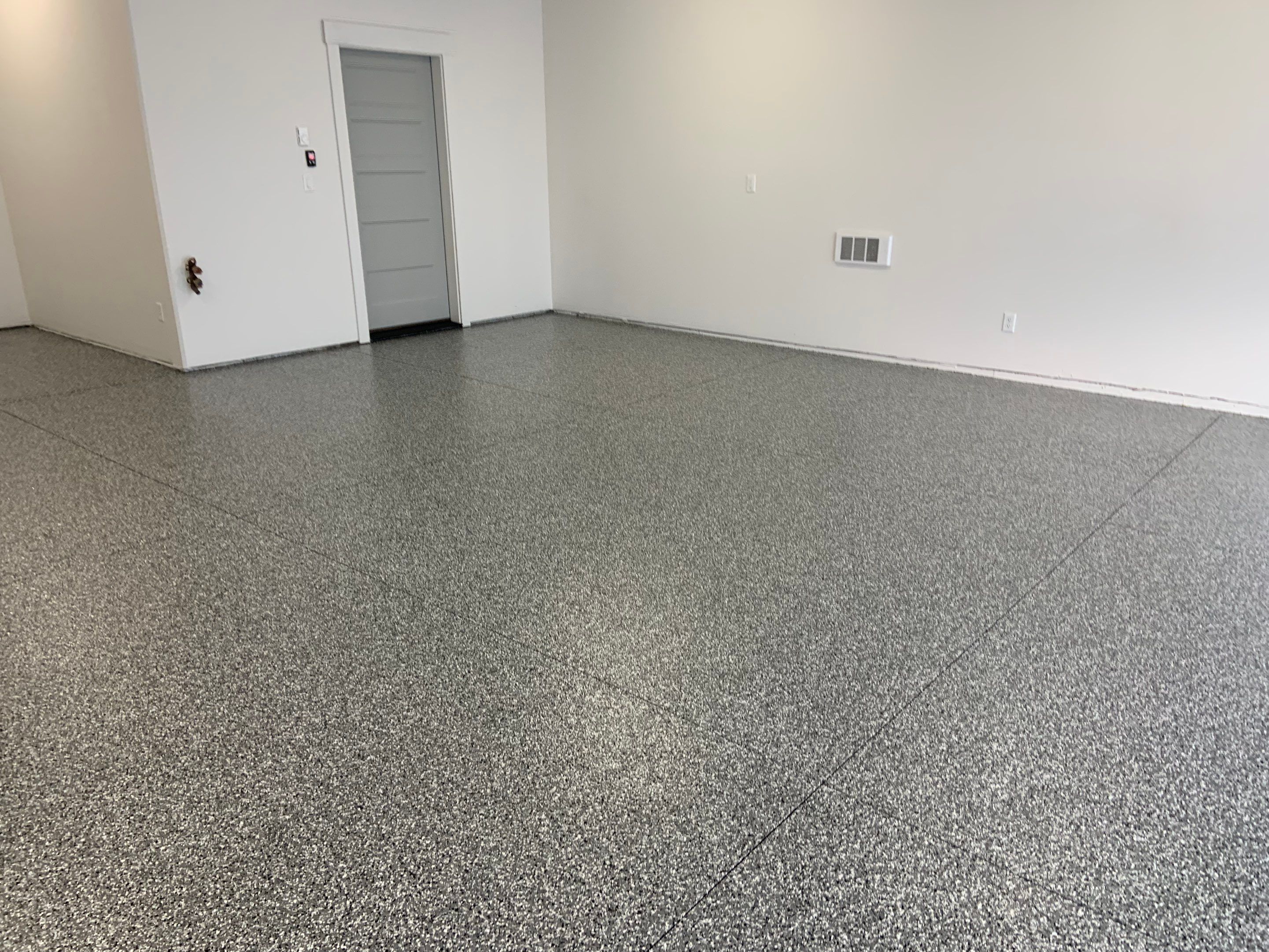 Garage Transformation using Smoke by Croc Coatings, LLC