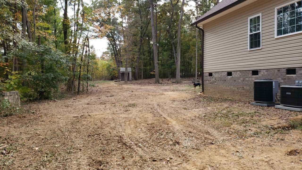 land clearing using machinery by Power Wash Masters LLC