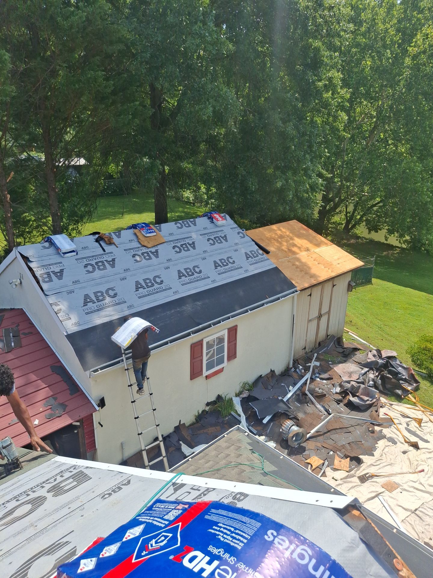 Residential Roofing Installation using GAF Timberline HDZ Weatherer Wood by Rainstoppers Roofing