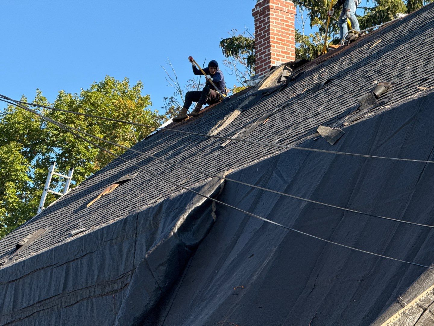 Half Roof Replacement for Solar Installation – Townhouse with New Plywood Decking by Sensible Home Solutions