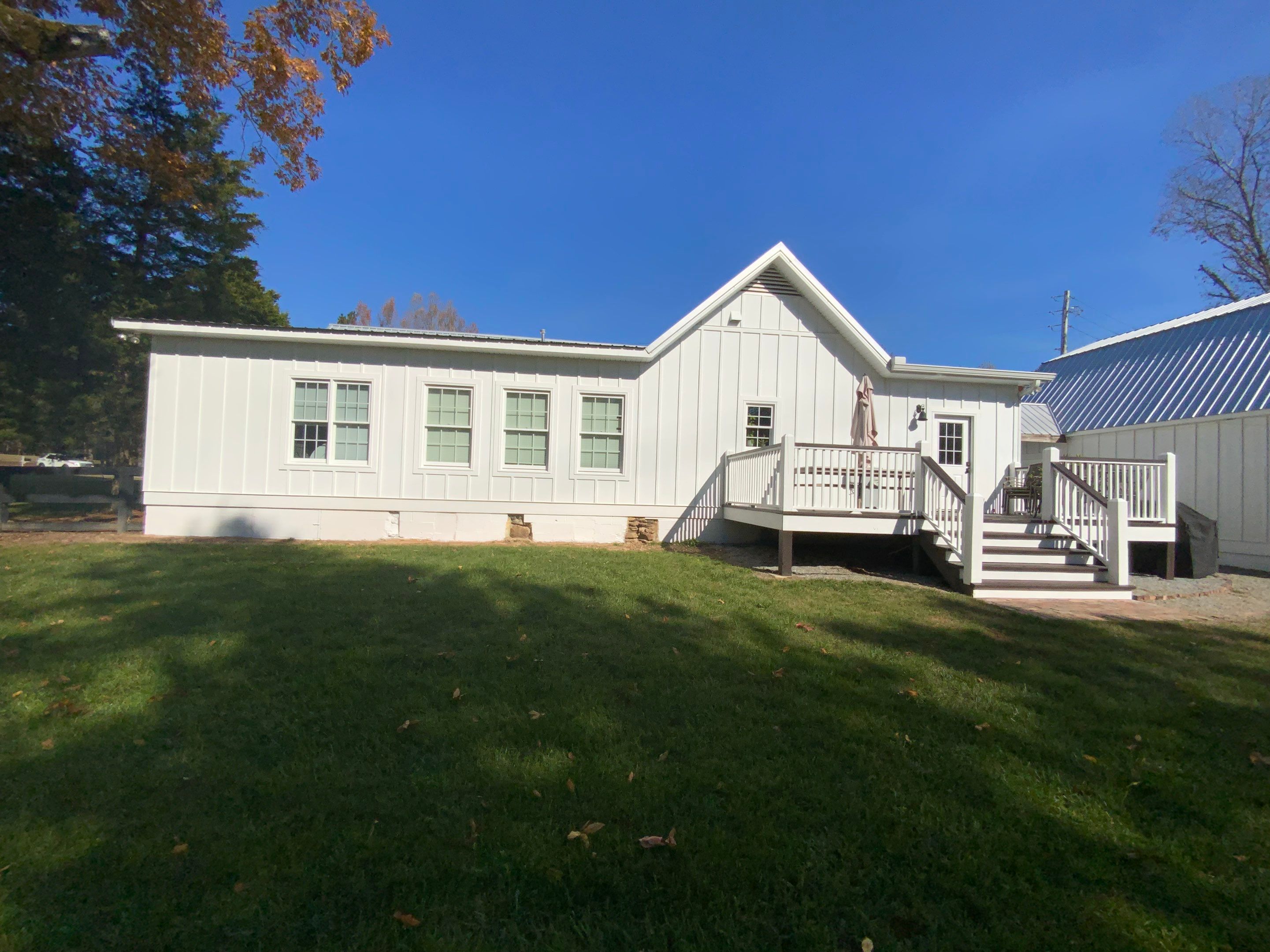 Exterior Trim Painting and Dark Deck Staining in Acworth by Swift Home Renovations