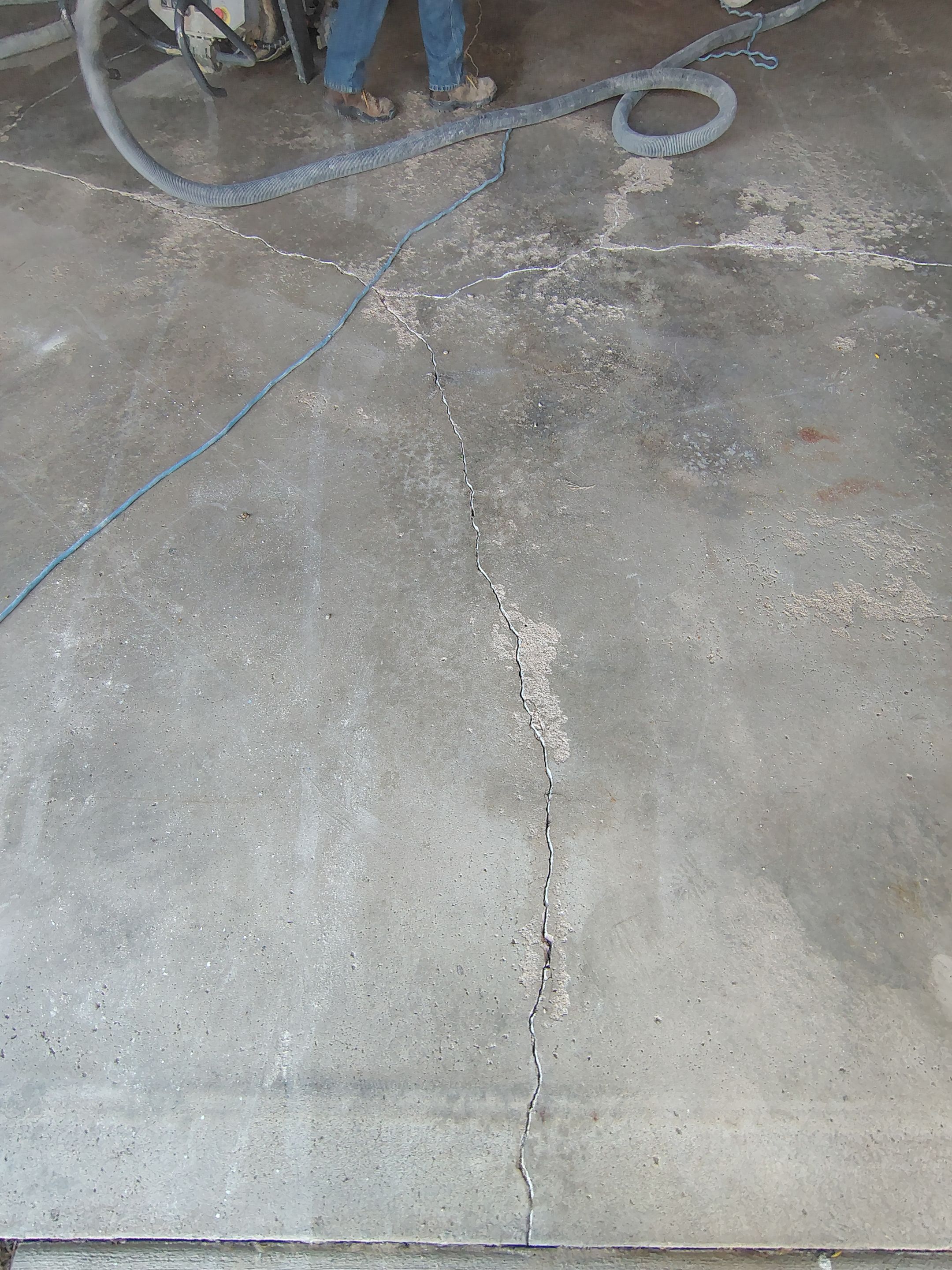 Sioux Falls Garage Epoxy Floor Installation and Concrete Crack Repair by Select Painting, Coatings & Garage Cabinets