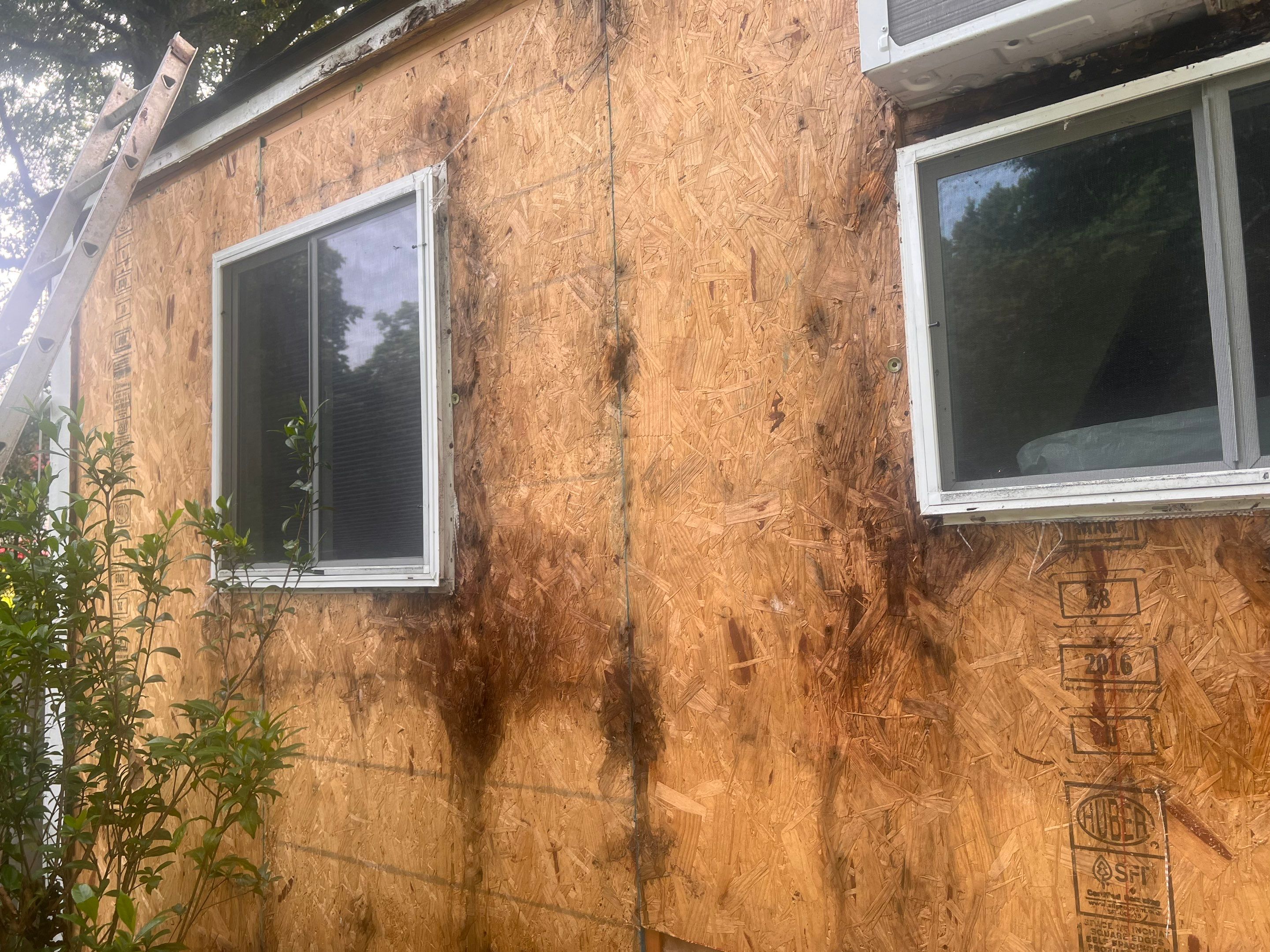 tiny home remodel- siding,paint,roofing by Nailed It Roofing & Remodeling LLC