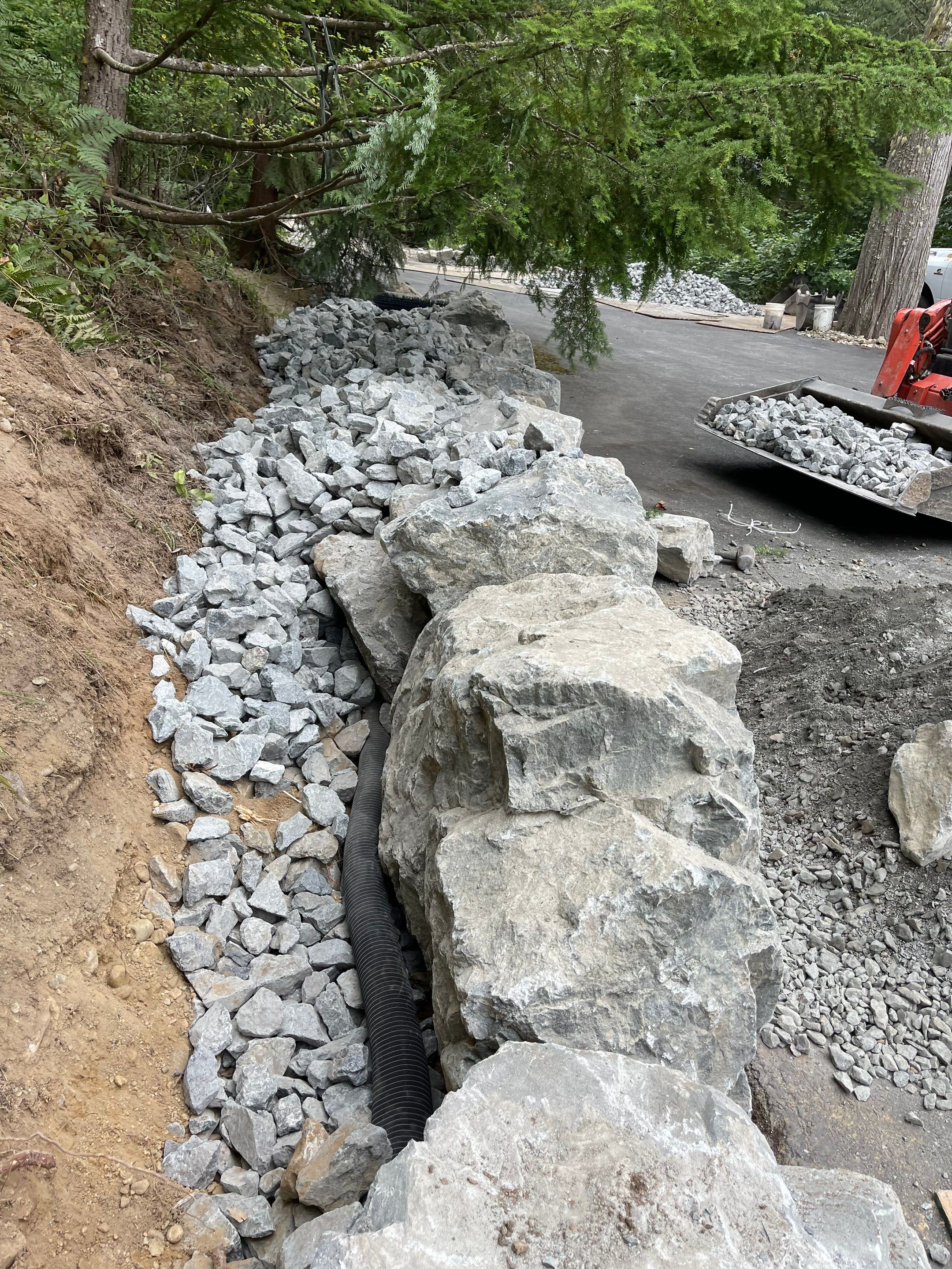 Jim | Rockery Wall, Landscaping, Road Repair & Sealcoating by Jireh Asphalt & Concrete Inc 