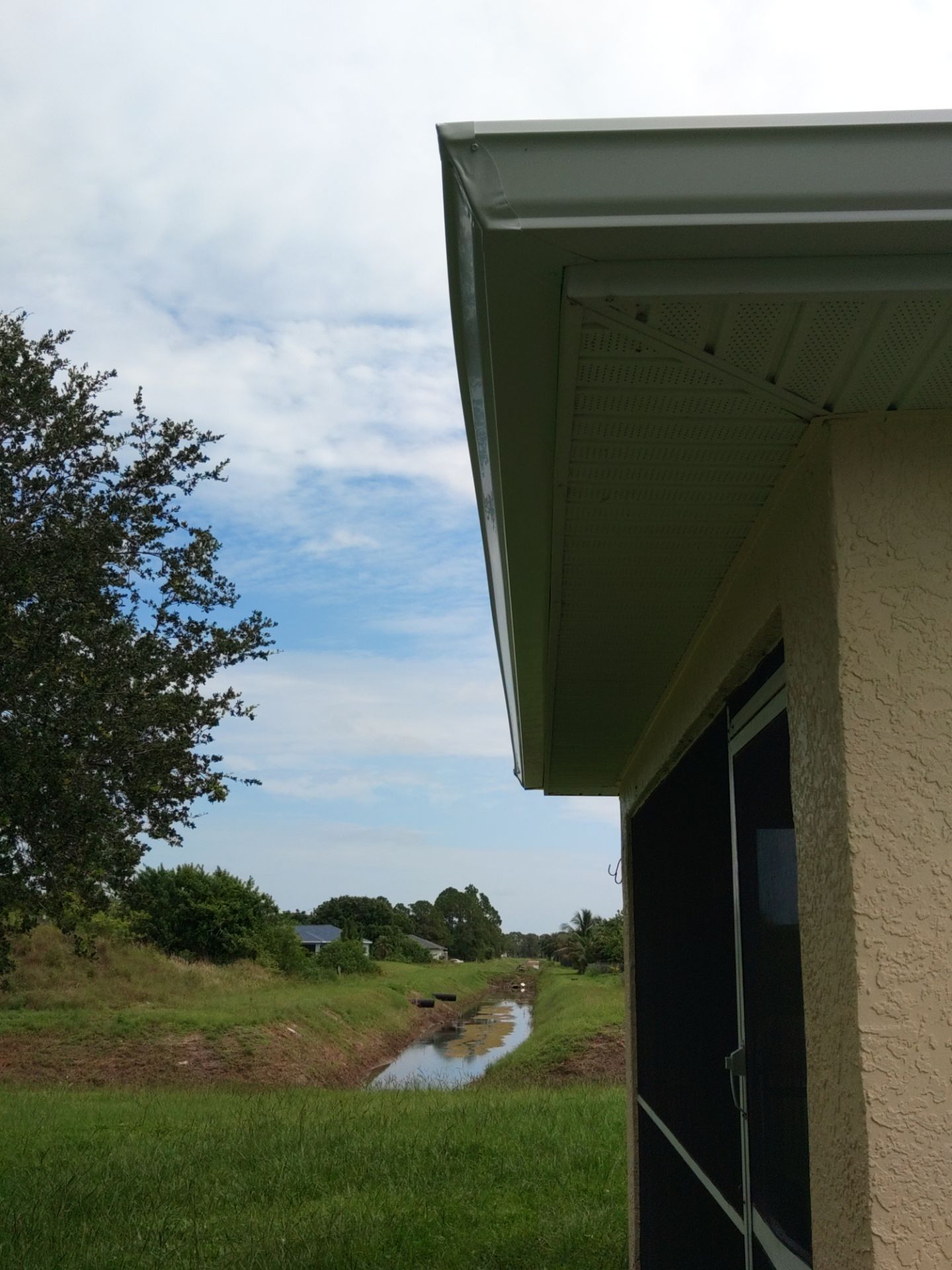 Seamless gutters in Lehigh Acres, FL provide a strong and efficient solution for managing heavy Florida rainfall by Gutter Professors