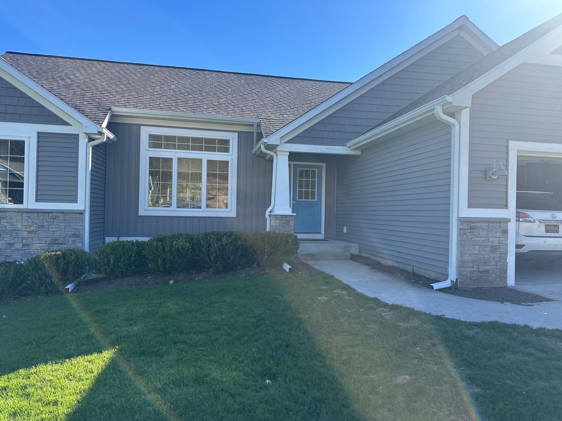 Seamless Gutter and Downspout Replacement for Suttons Bay Residence by Rainbow Seamless Systems