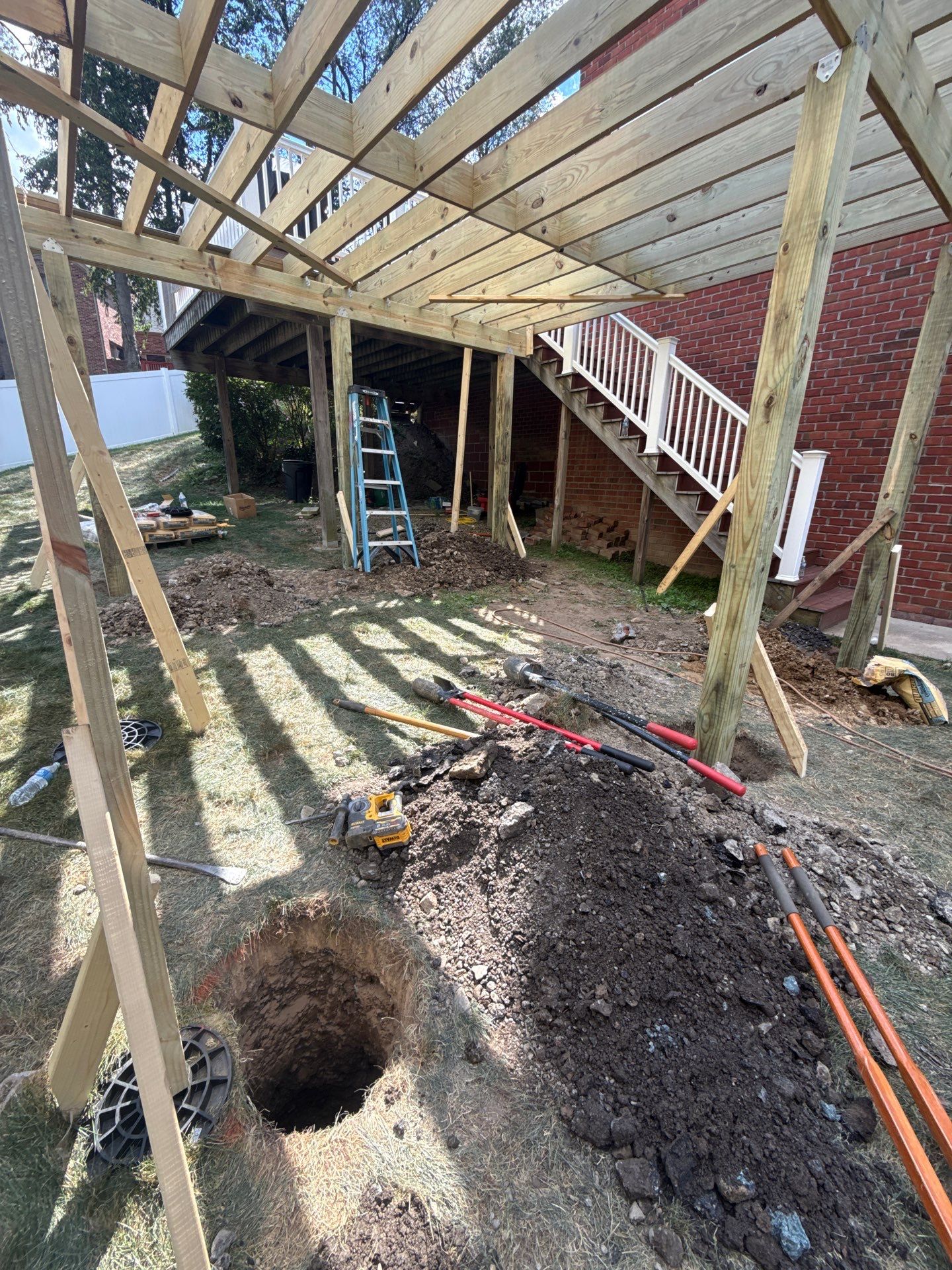 Deck extension  by Cousins Roofing Siding & Decks