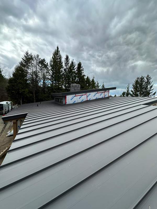 Residential Roofing Installation using 24 Ga Standing Seam Metal by Jay Carter Roofing & Sheet Metal