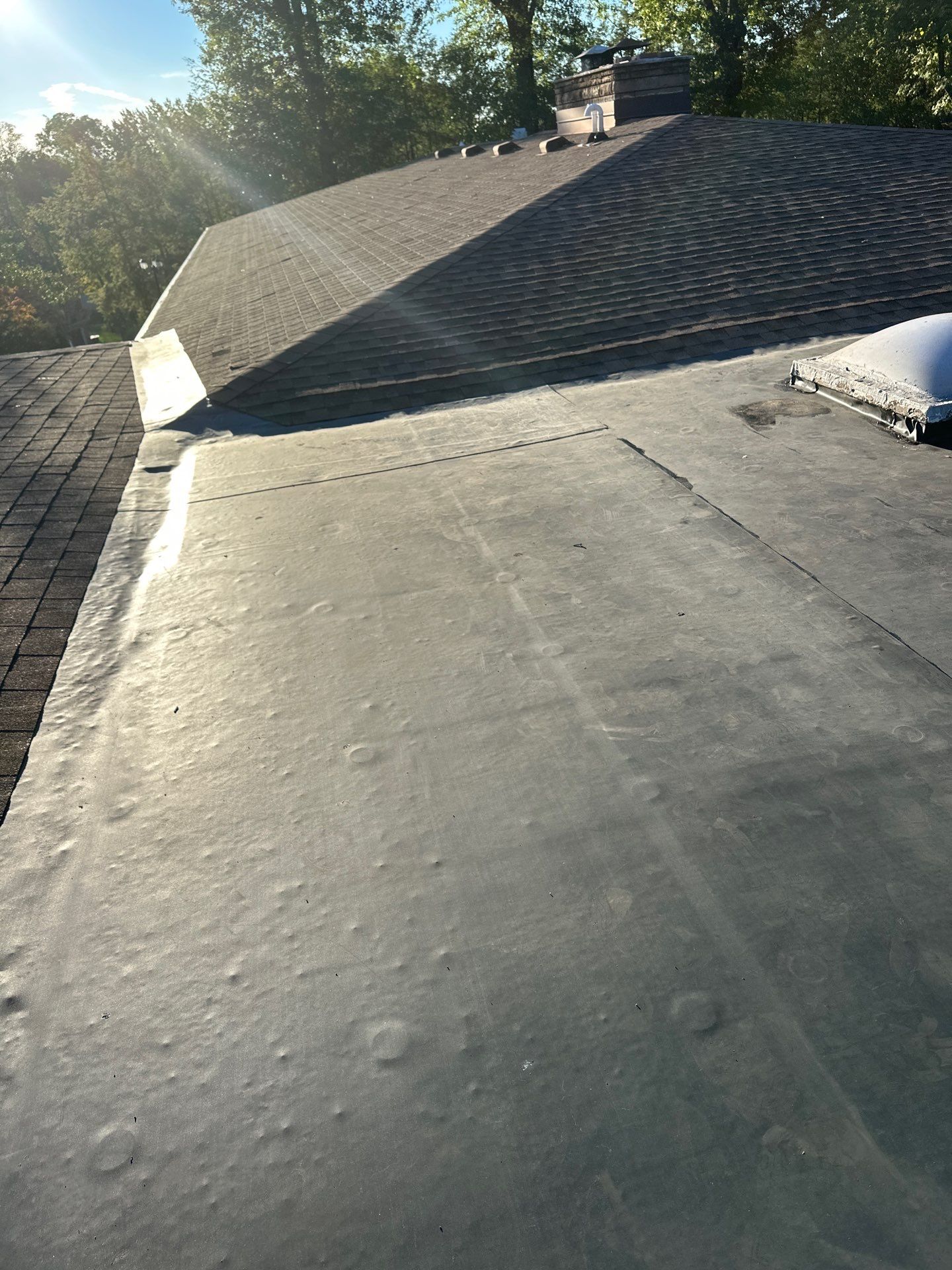 Residential Roofing Installation using EPDM  by Rainstoppers Roofing