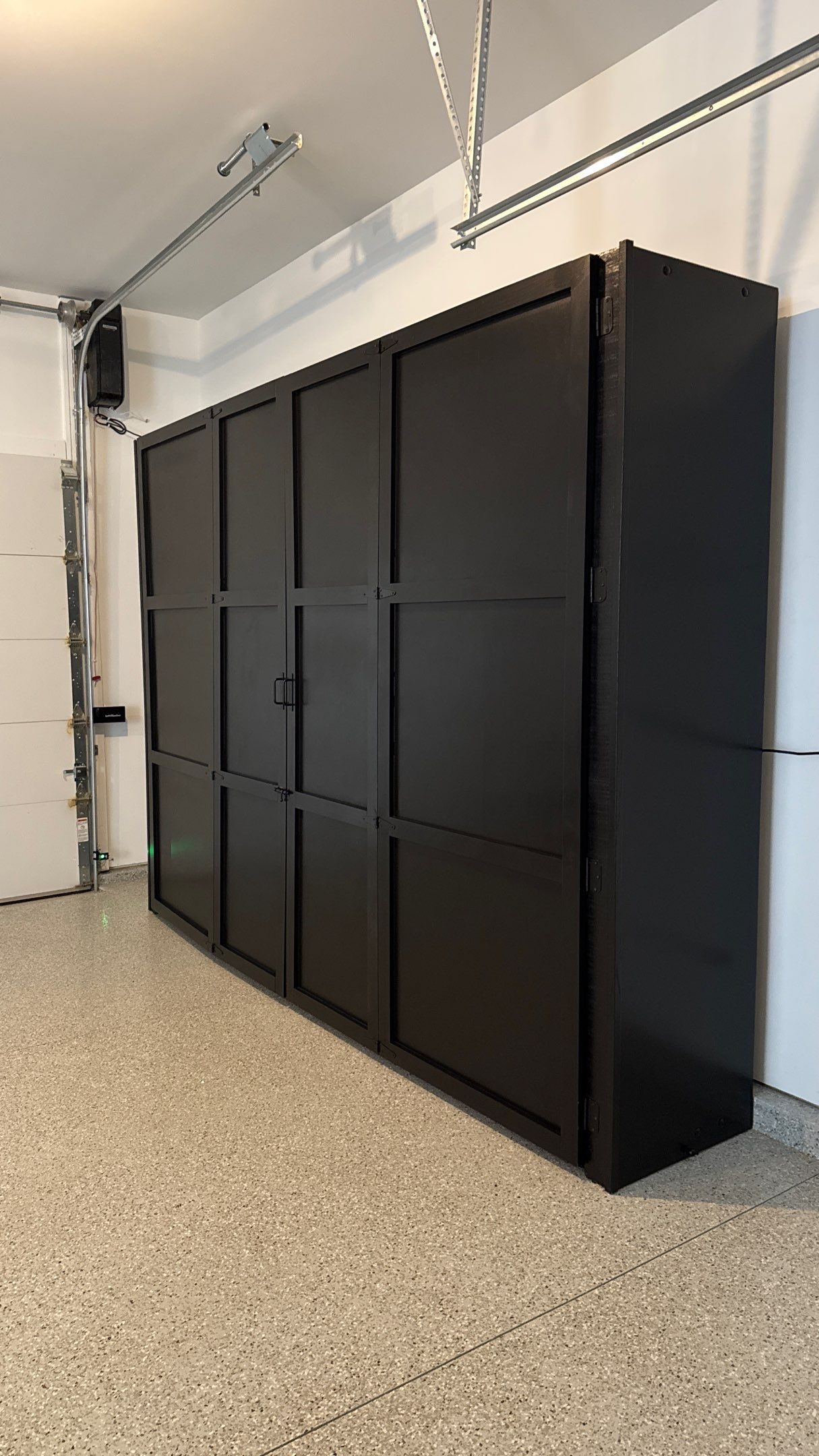 Ben Took It To The Next Level With a Golf Simulator by Banner Garage