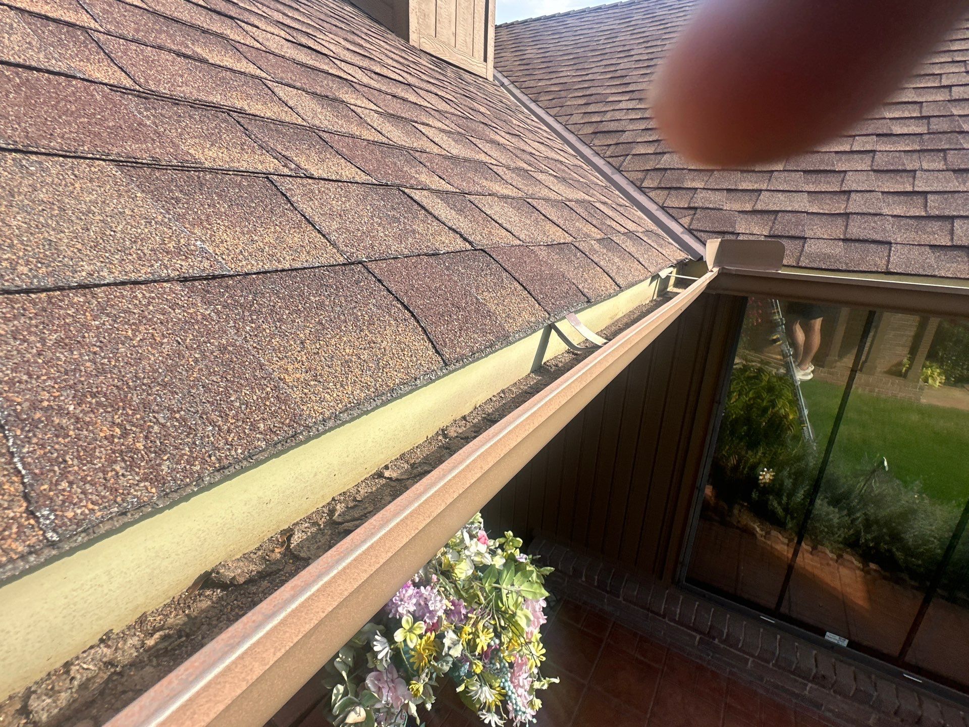 Hail Damage Roof Inspection in Oklahoma City, OK by McCann's Roofing and Construction