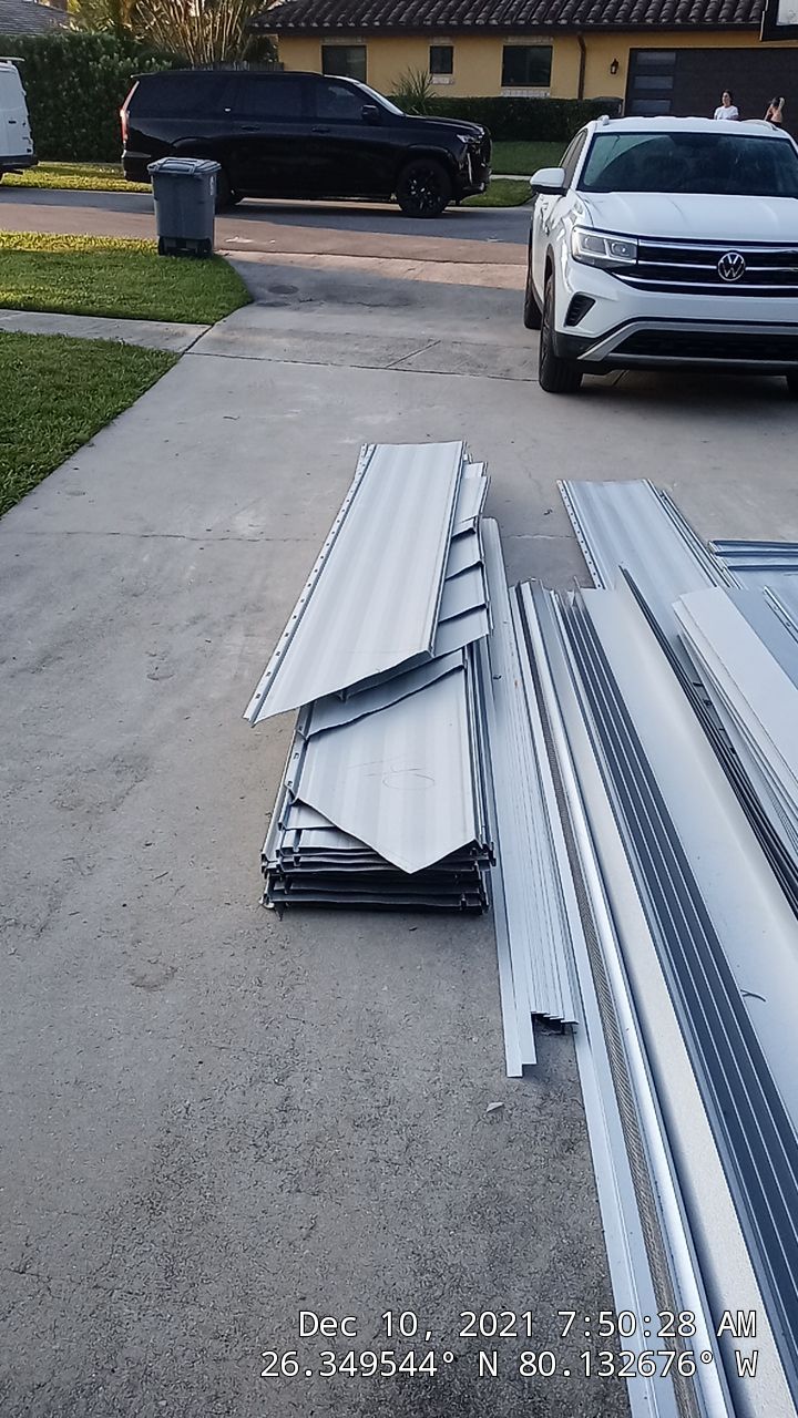 Residential Roofing Installation using 1" Nail strip metal roof by BLUES BROTHERS ROOFING