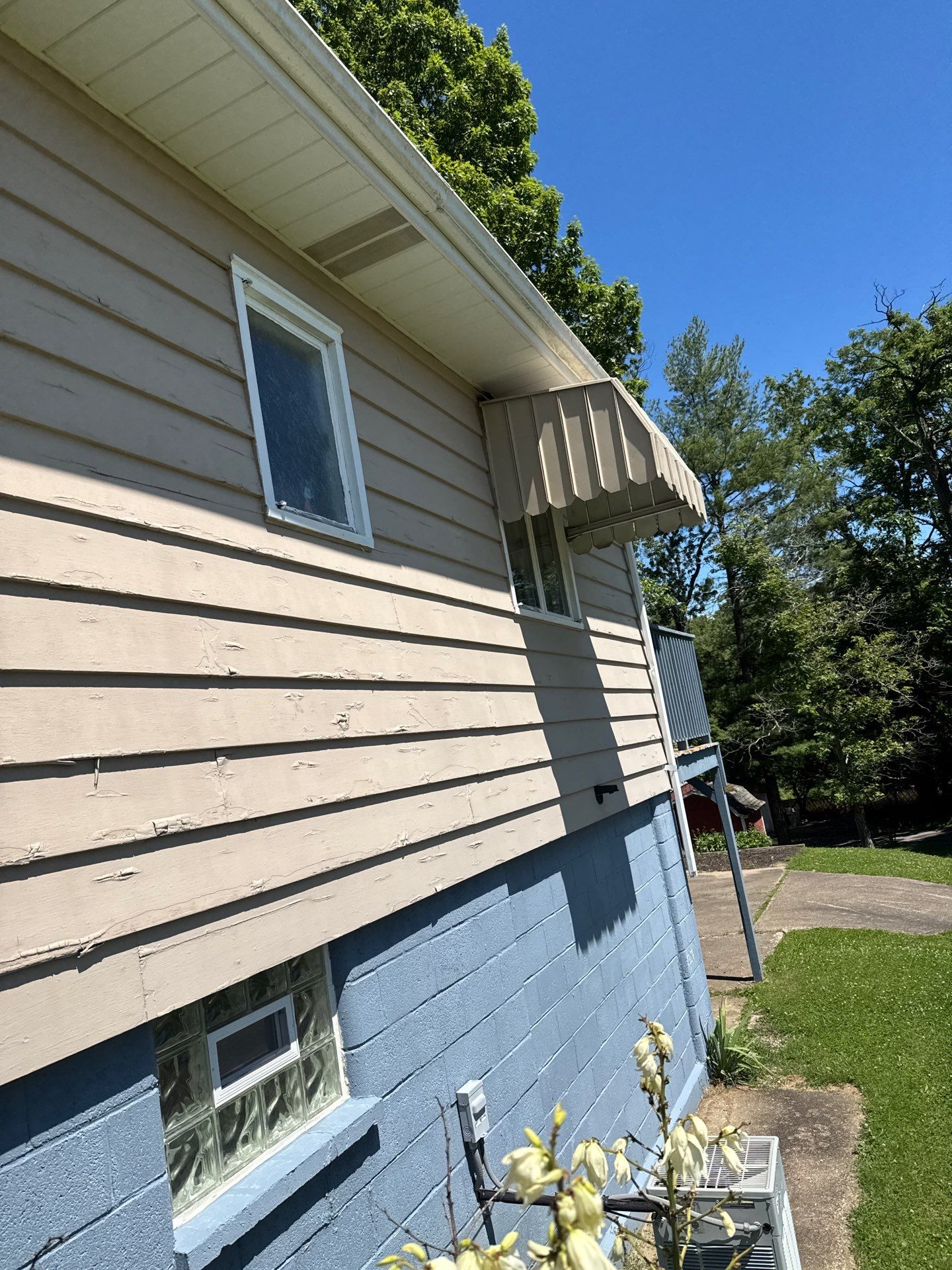 White Vinyl Sliding Window and Glass Block Installation in Columbus by Ohio State Windows