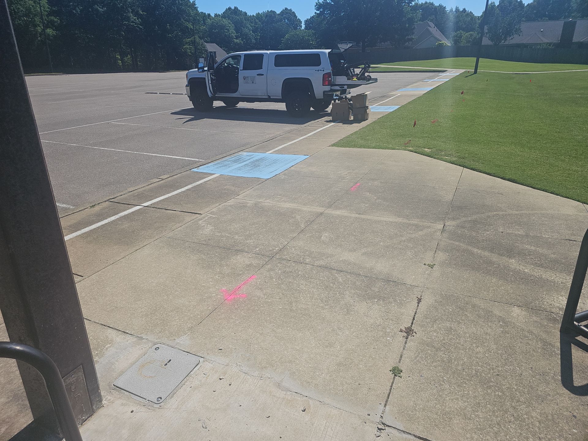 Utility Locating at a school for fence install by Alsip Locating Service, LLC