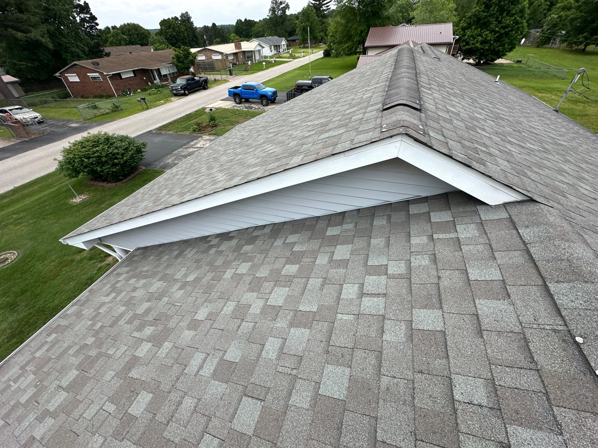 Residential Roof + Gutters & Downspouts Install  by Titan Commercial & Residential Roofing 