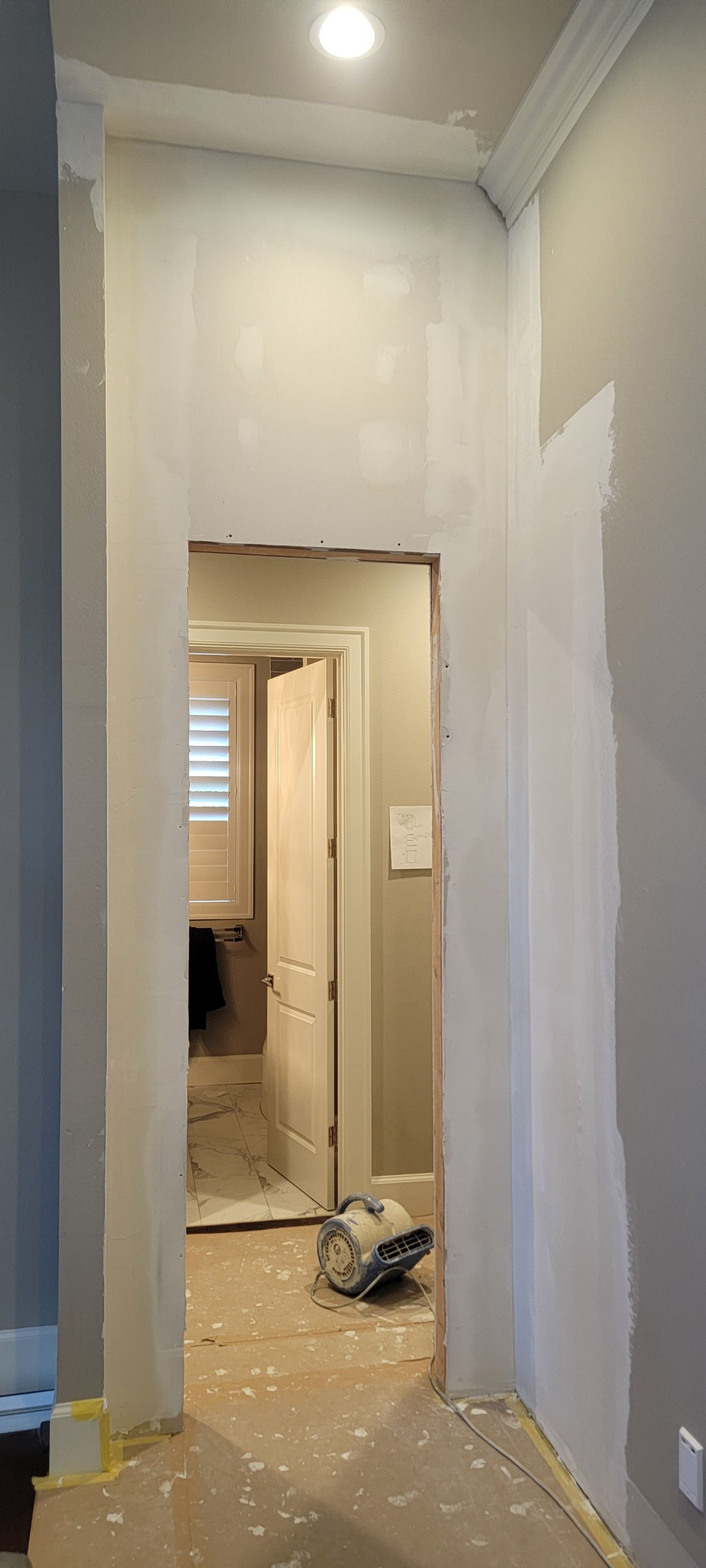 Closet transformation to coffee nook with custom shelves and LED lighting. by Crm Services Llc