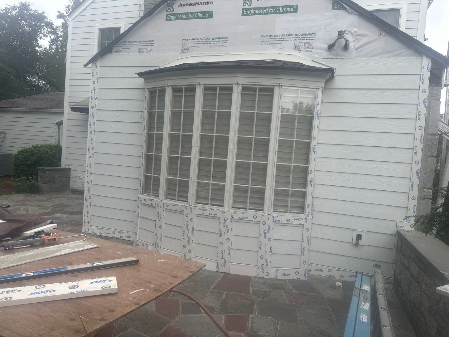 Siding Installation using Hardie Plank Artic white by A Plus Exterior