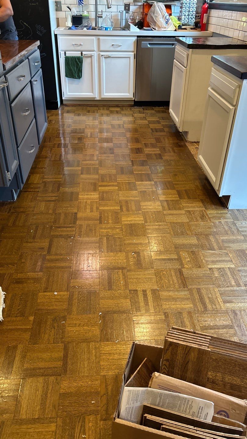 Parquet floor and stair treads by Footprints Floors of Nashville