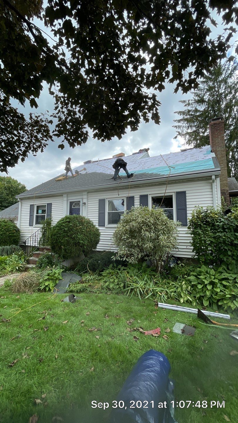 New Skylights and Roof in Belmont, MA by Master Roof Inc