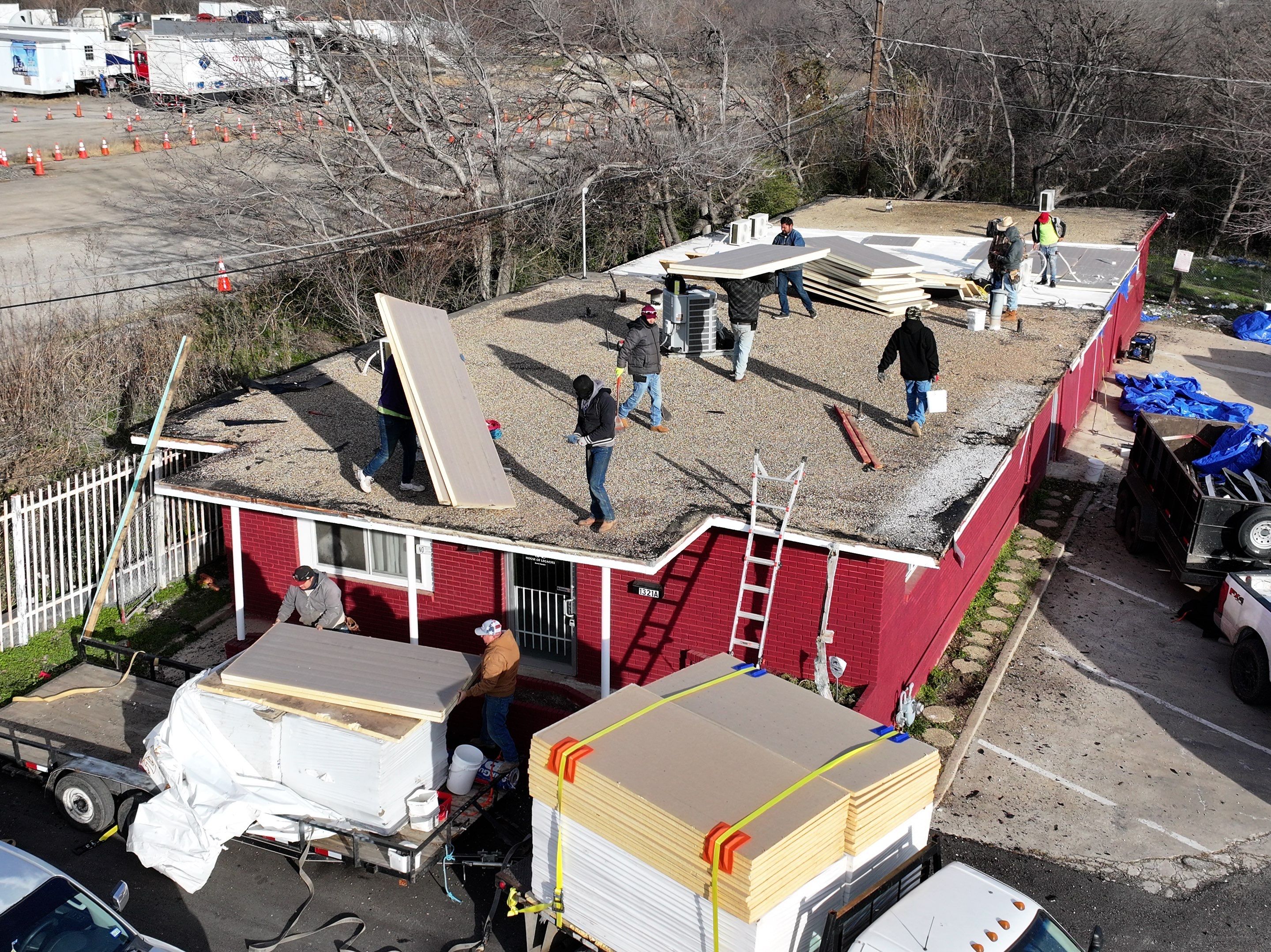 Commercial roofing overlay using GAF TPO over an old ballast roof by Becker Roofing and Exteriors