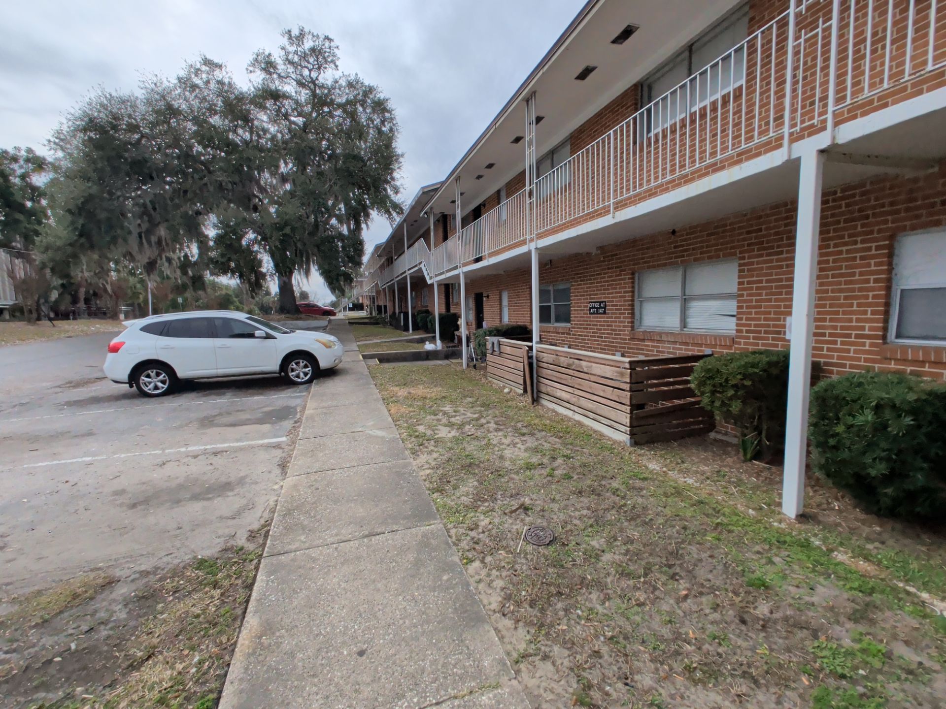 Apartment Landscape Cleanup & Ongoing Grounds Maintenance — Cimarron Apartments (Arlington) by Harmoni Home Services