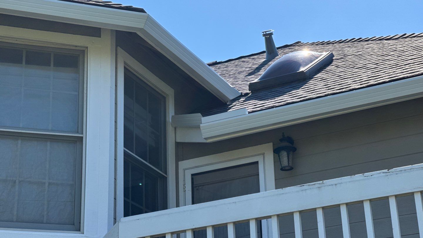 New shingles and gutters using GAF Timberline HDZ shingles and aluminum gutter by Straight Edge Roofing Inc