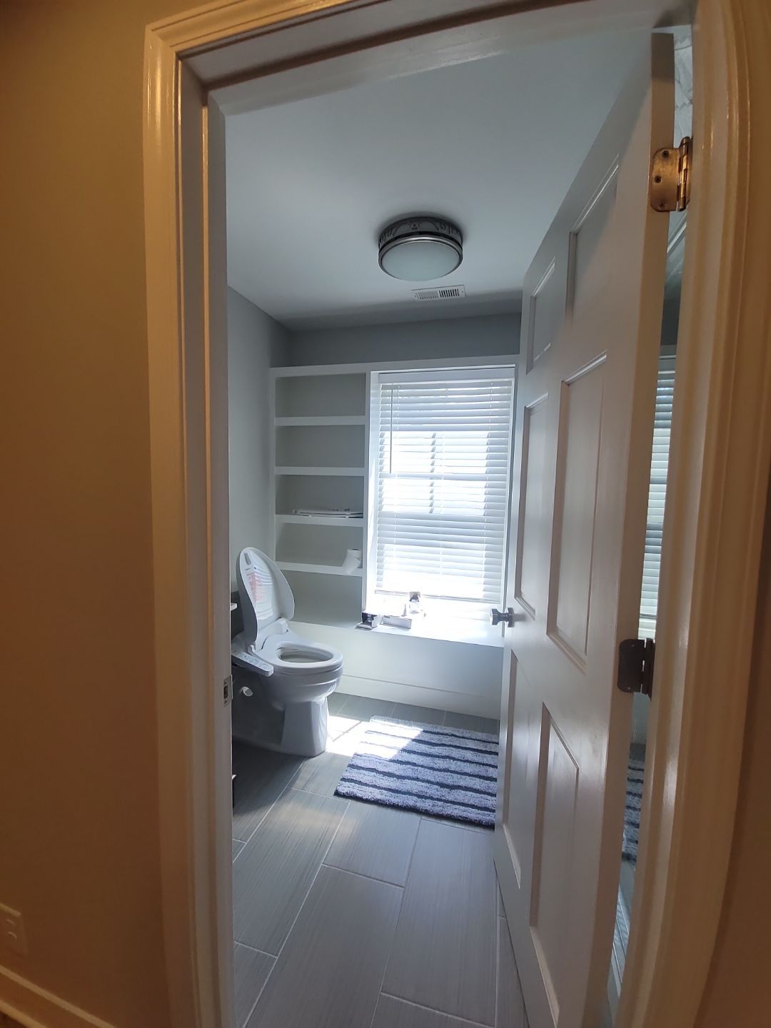 From Rafters to Retreat: An Attic Transformed with a Luxe Bath Escape by Elite Remodeling and Design LLC