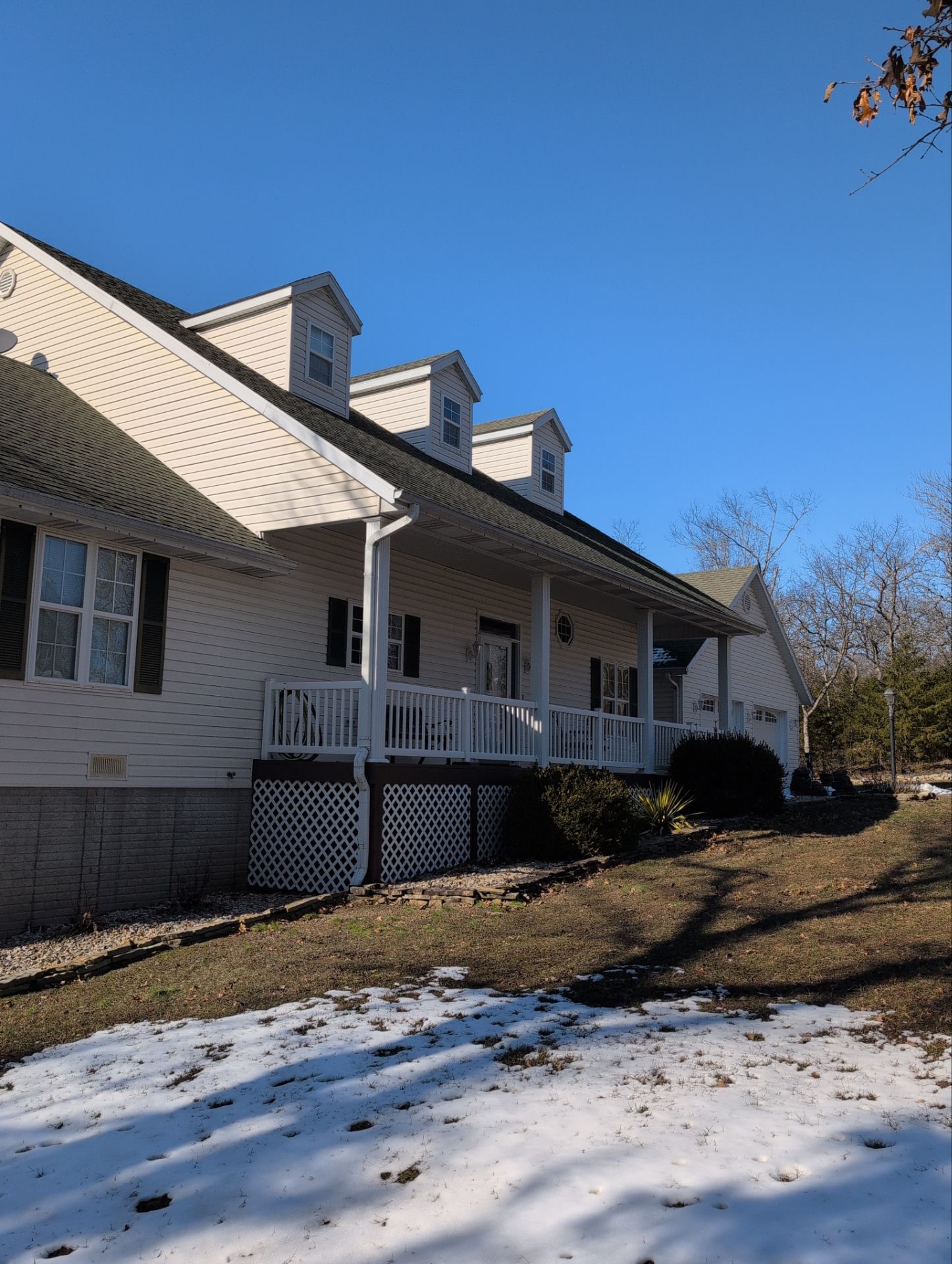 Roof Replacement & Gutter Guards in Galena by Table Rock Design + Build