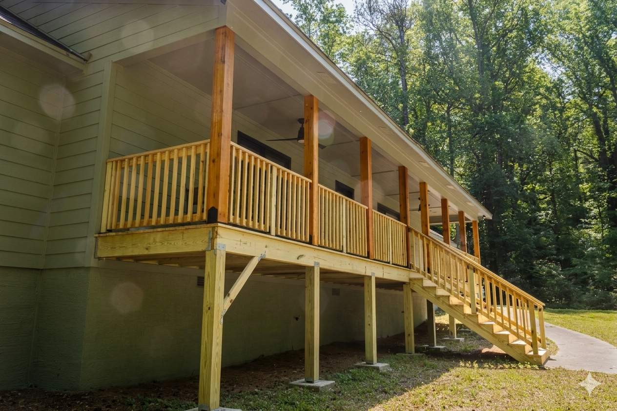 Smyrna, GA Full James Hardie Siding Replacement and Wood Front Porch Rebuild by Nelson Exteriors