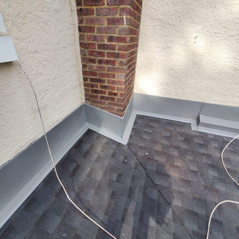 New Roof & Gutters by Island Roofing Inc.