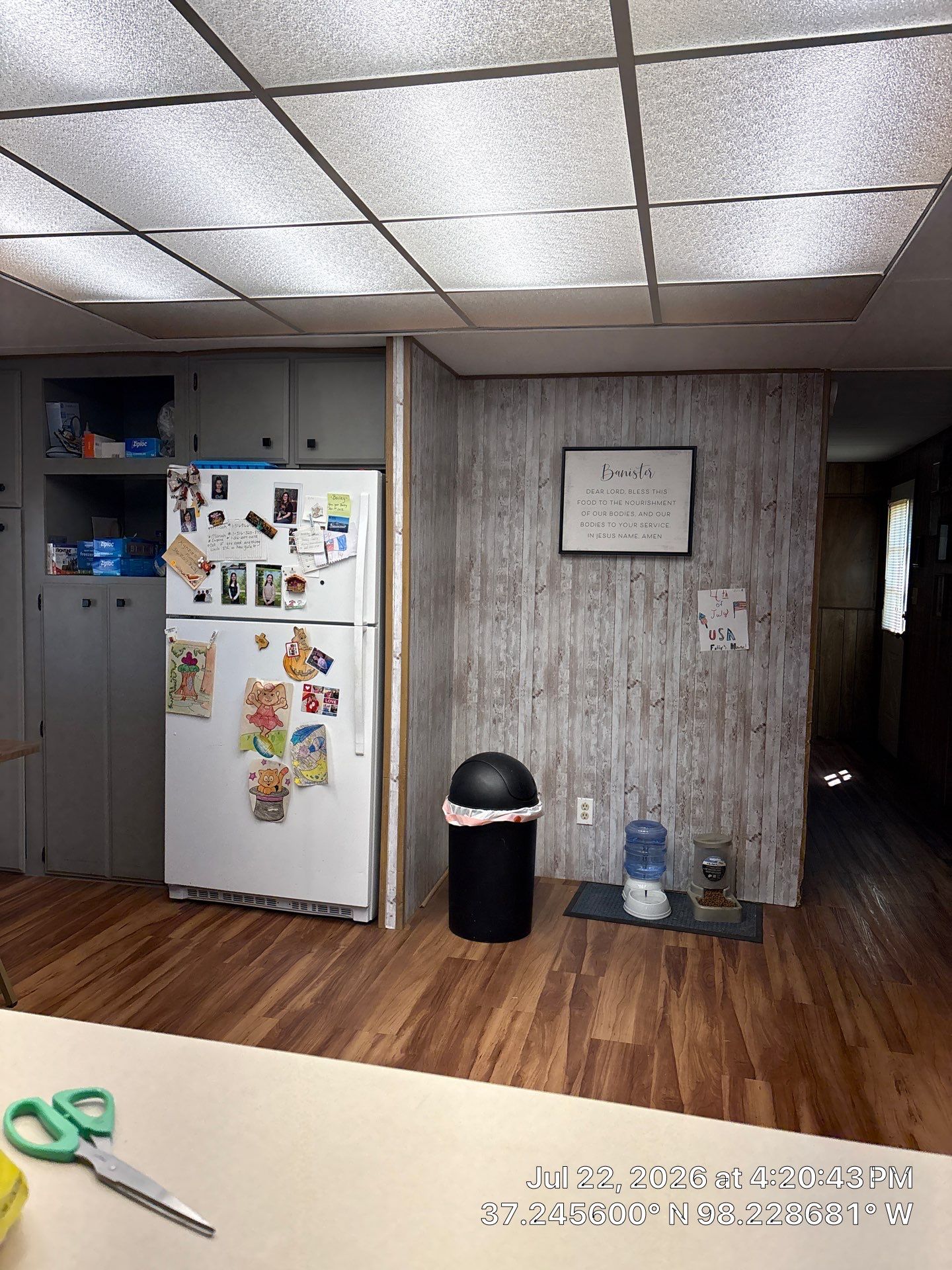 Kitchen Renovation Featuring Grey Cabinetry and Laminate Flooring in Attica by CompanyCam Sales Demo