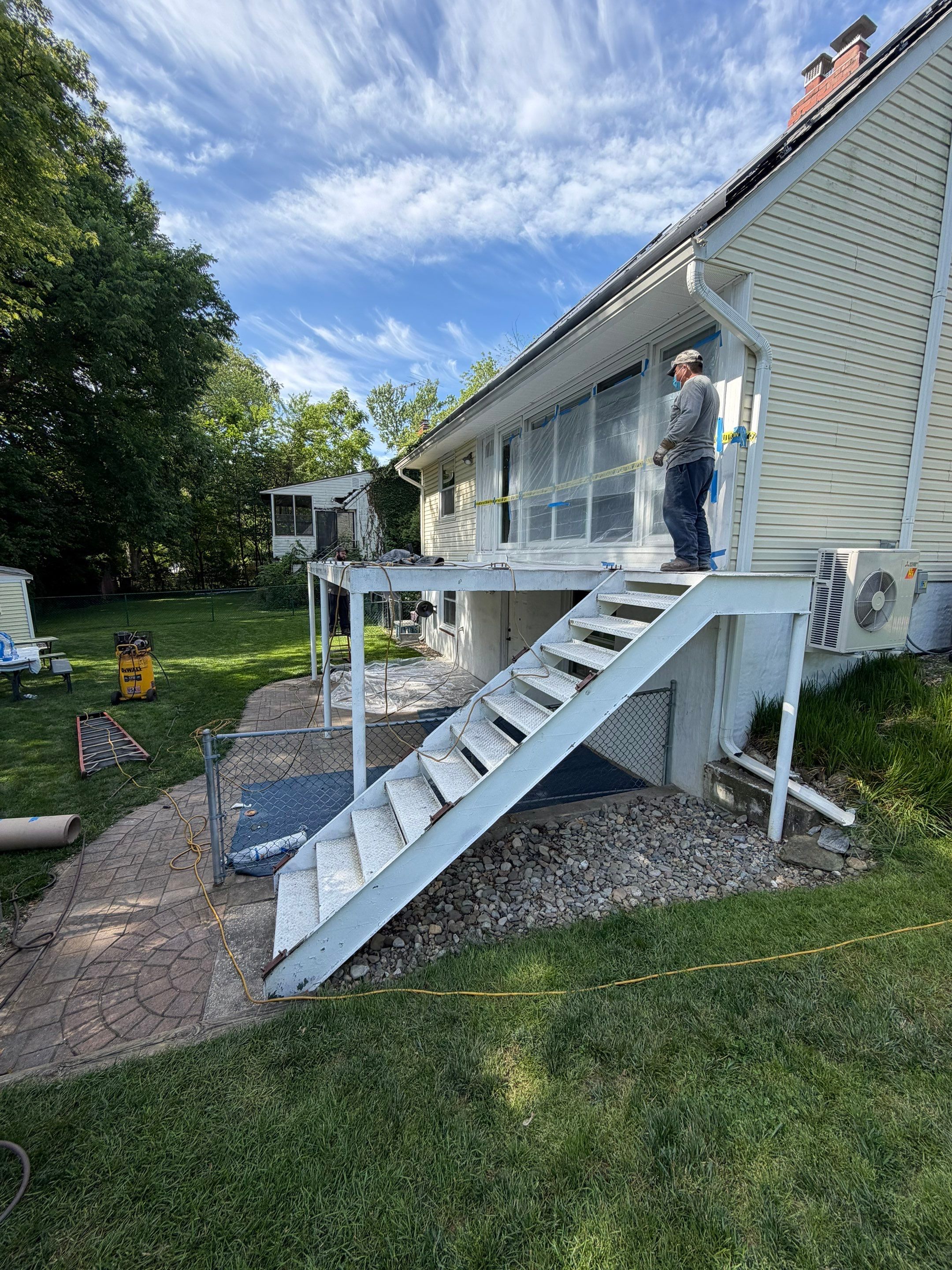 White Powder-Coated Outdoor Railings in Rockville & Staircase and Deck Refurbishment  by Capitol Iron Works