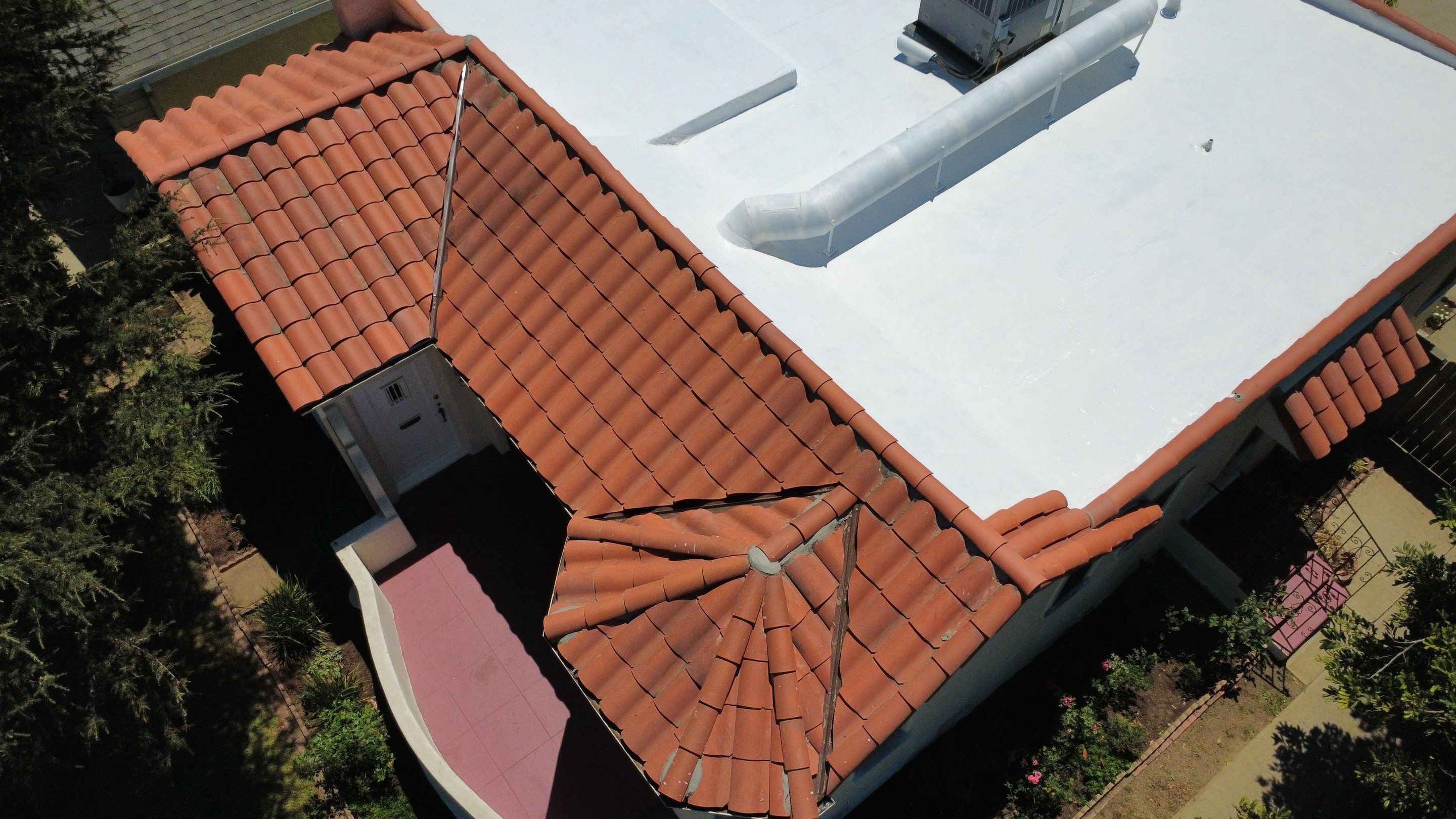 Tile Reset and Silicone Membrane Installation by Hull Brothers Roofing