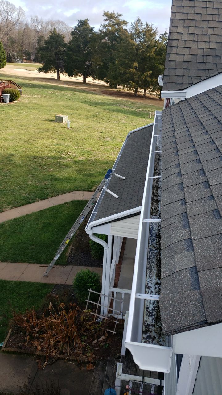 Gutter Cleaning using water by Power Wash Masters LLC