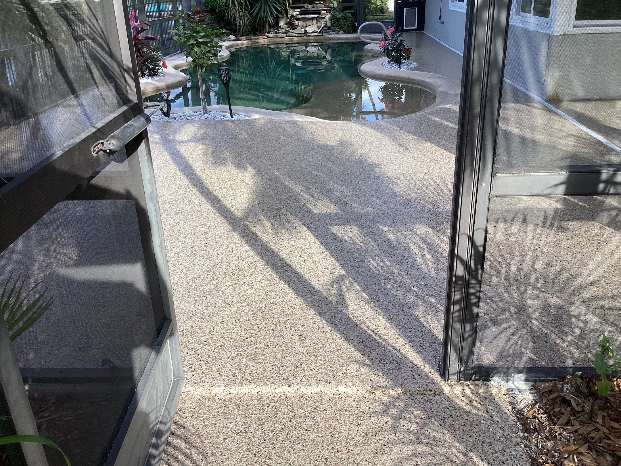 Pool Deck using Pecan by Amvet concrete coatings llc