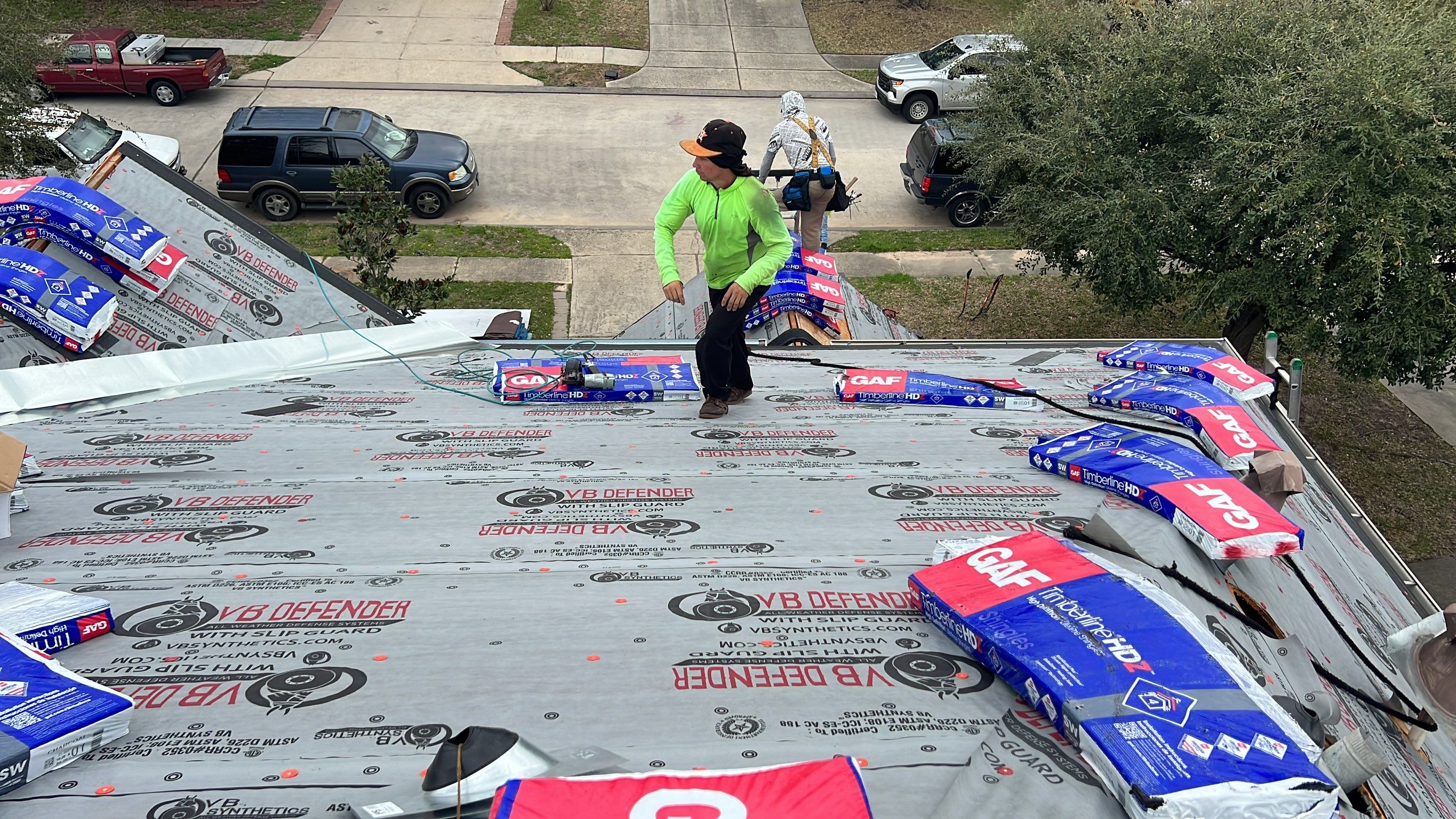 Slate-Gray Roof on Stone-Front Home — Spring, TX by PL Roofing & SB Roofing, LLC.