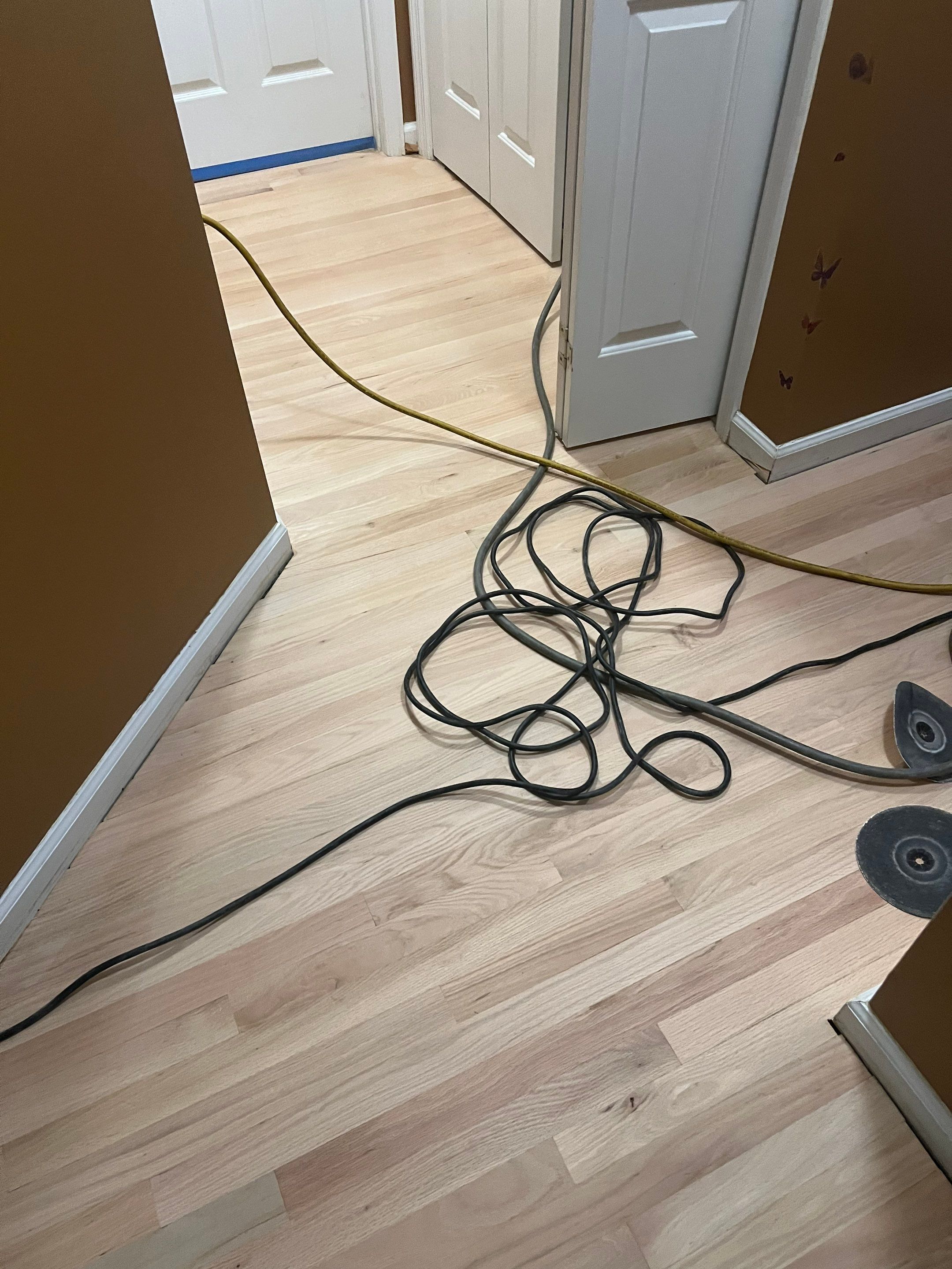 Refinishing an old Bruce prefinished hardwood floor by Accent Custom Floors