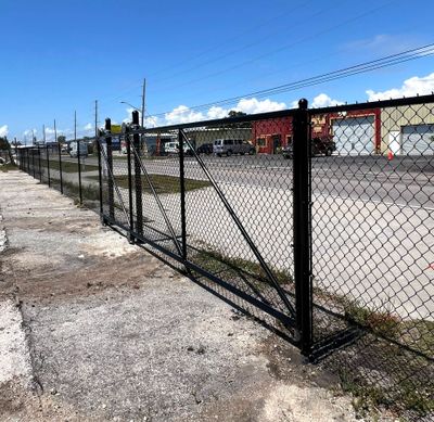 Chain-link Fence Installation using 6ft Black Chain Link Fence 