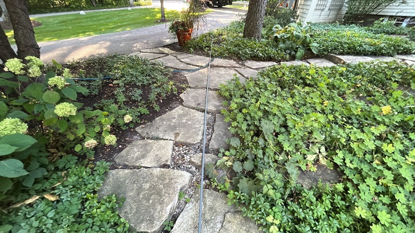 natural stone using Algaecide, soft wash soap by Northern Power Washing LLC.