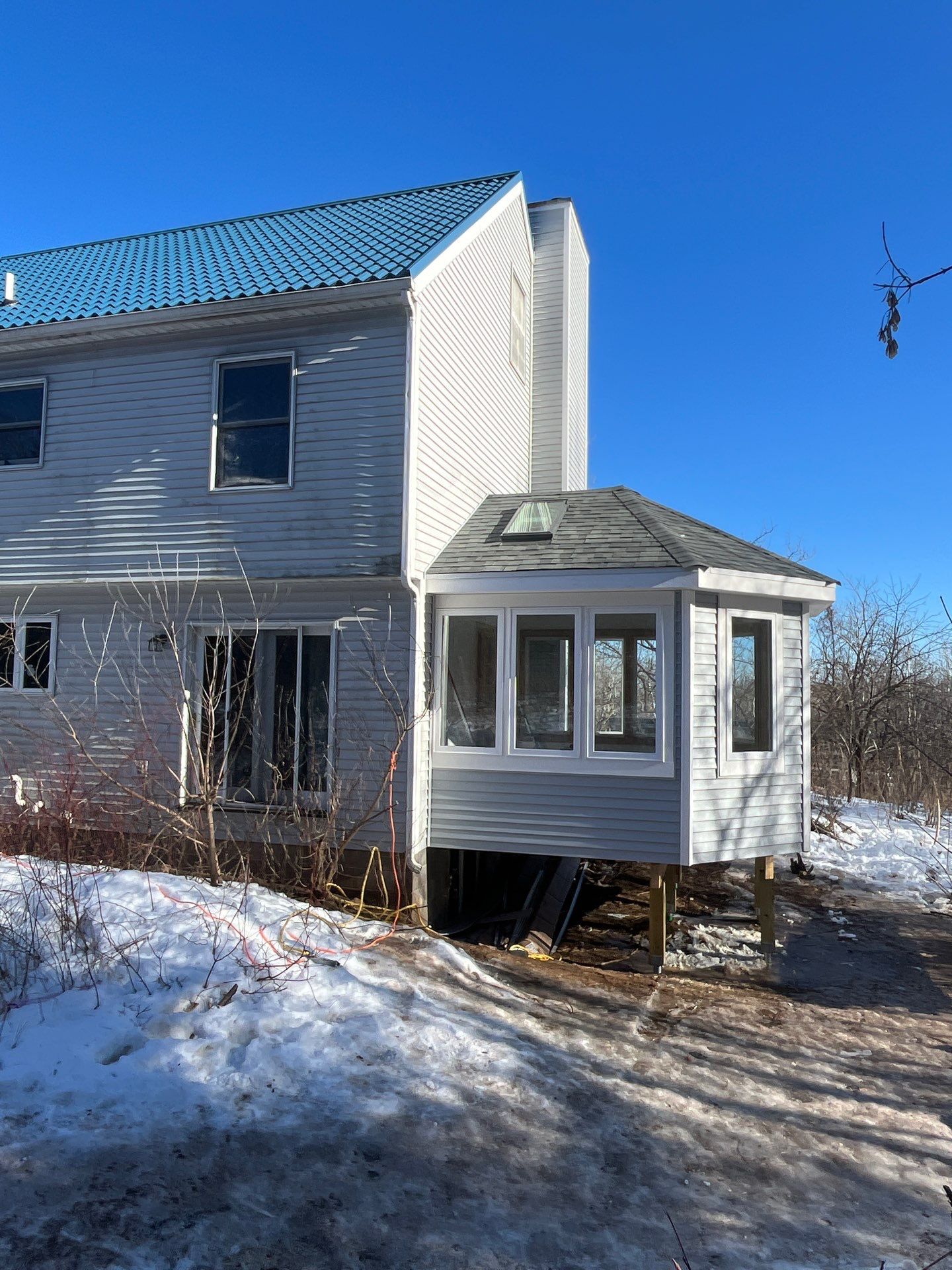 Sunroom Addition by Anchor North Property Services