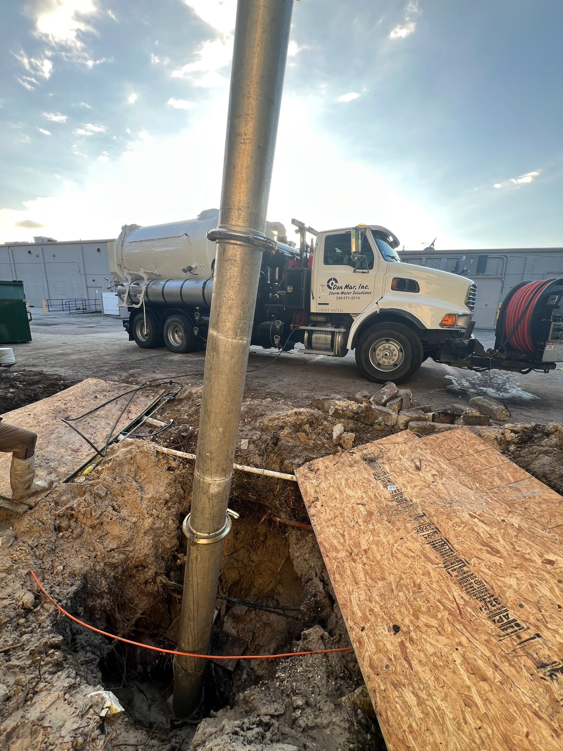 Hydro Excavating a Water Main for Repair by Don Mar, Inc. Storm Water Solutions