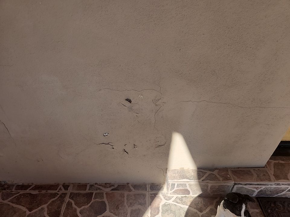 Significant Stucco Damage and Repair by Regal Renovate