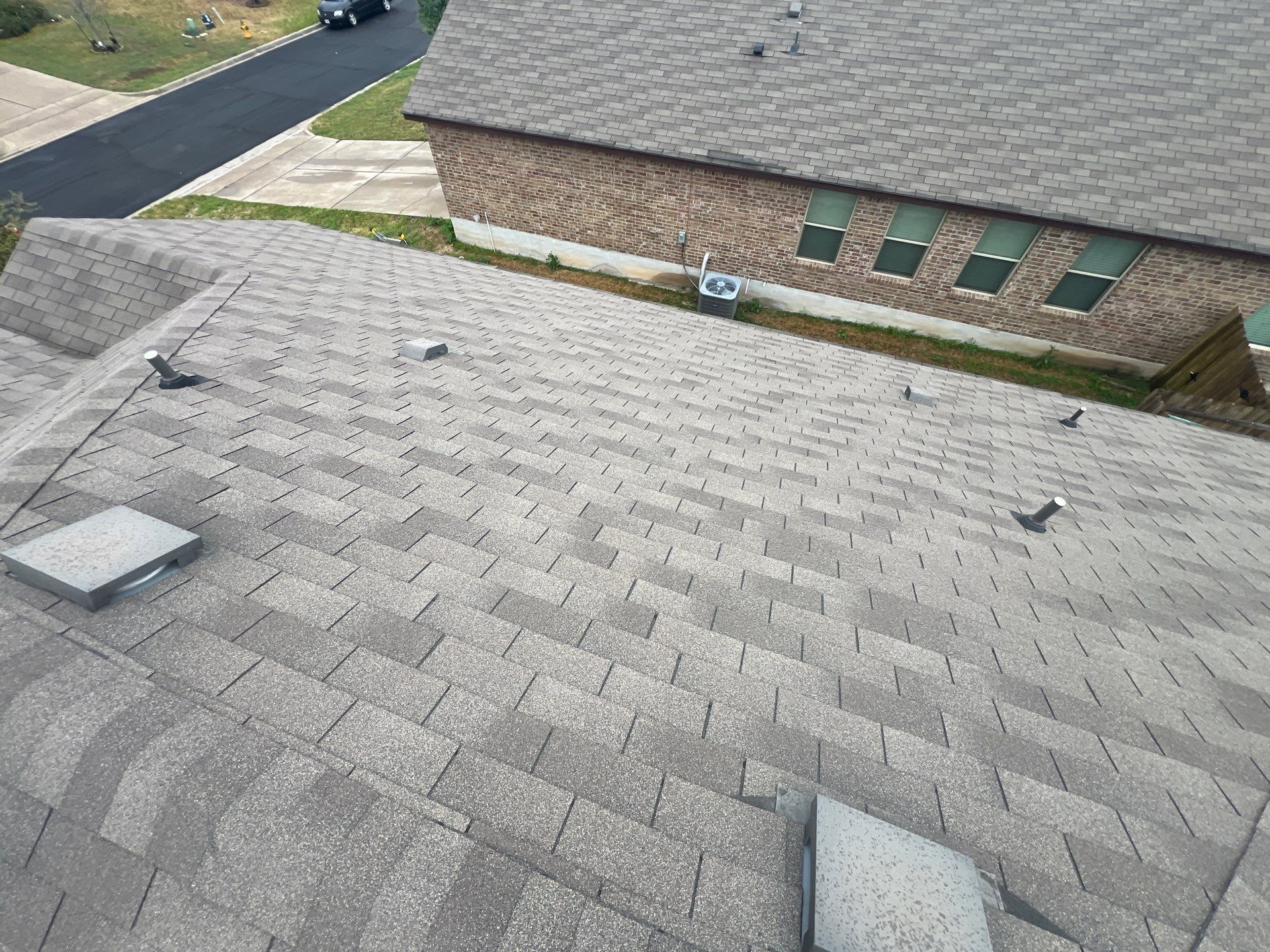 Residential Roofing Installation using IKO Nordic Class 4 Impact Resistant 30yr Architectural Shingles. Color: Castle Grey by WR Roofing Solutions