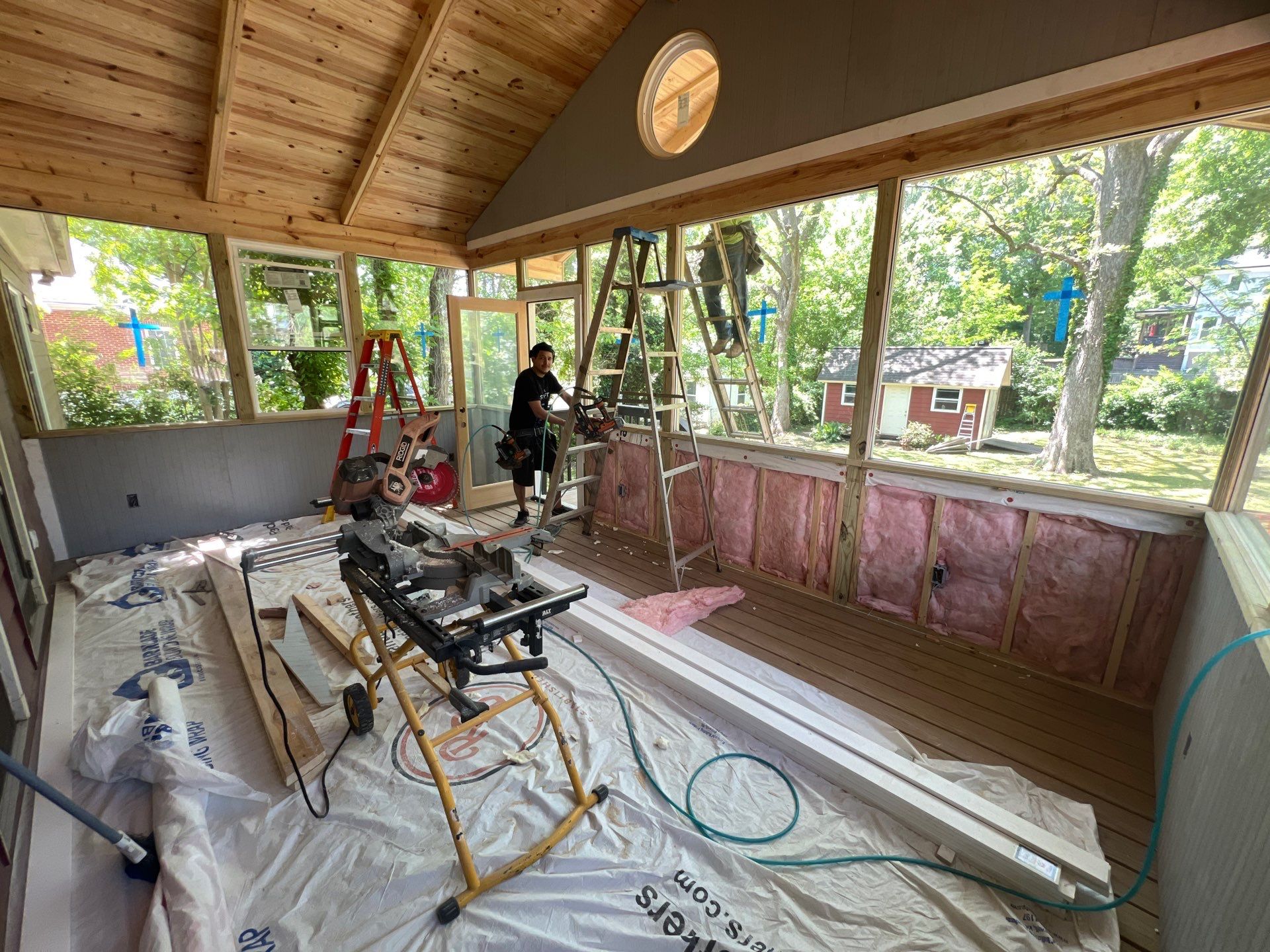 Elevated Screened-In Porch Addition with Vaulted Tongue-and-Groove Ceiling by Swift Home Renovations