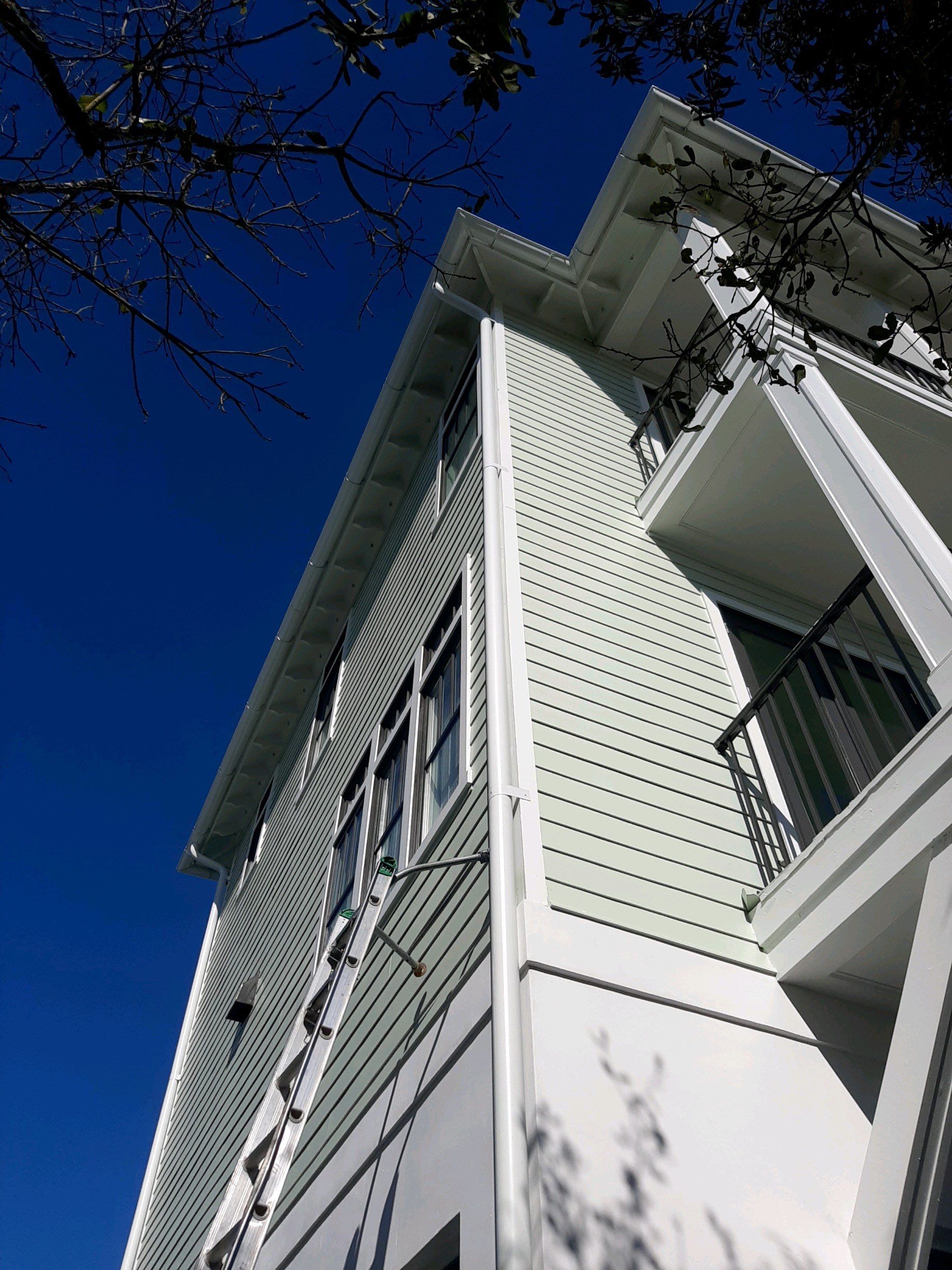 Gutter Installation Using White 6 Inch Seamless Gutters by Gutter Professors